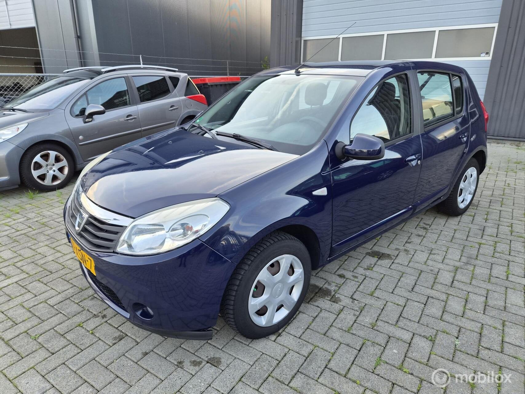 Dacia Sandero 1.2 Lauréate LPG G3 AIRCO/APK 09/2027, Auto's, Voorwielaandrijving, Euro 5, Gebruikt, 4 cilinders