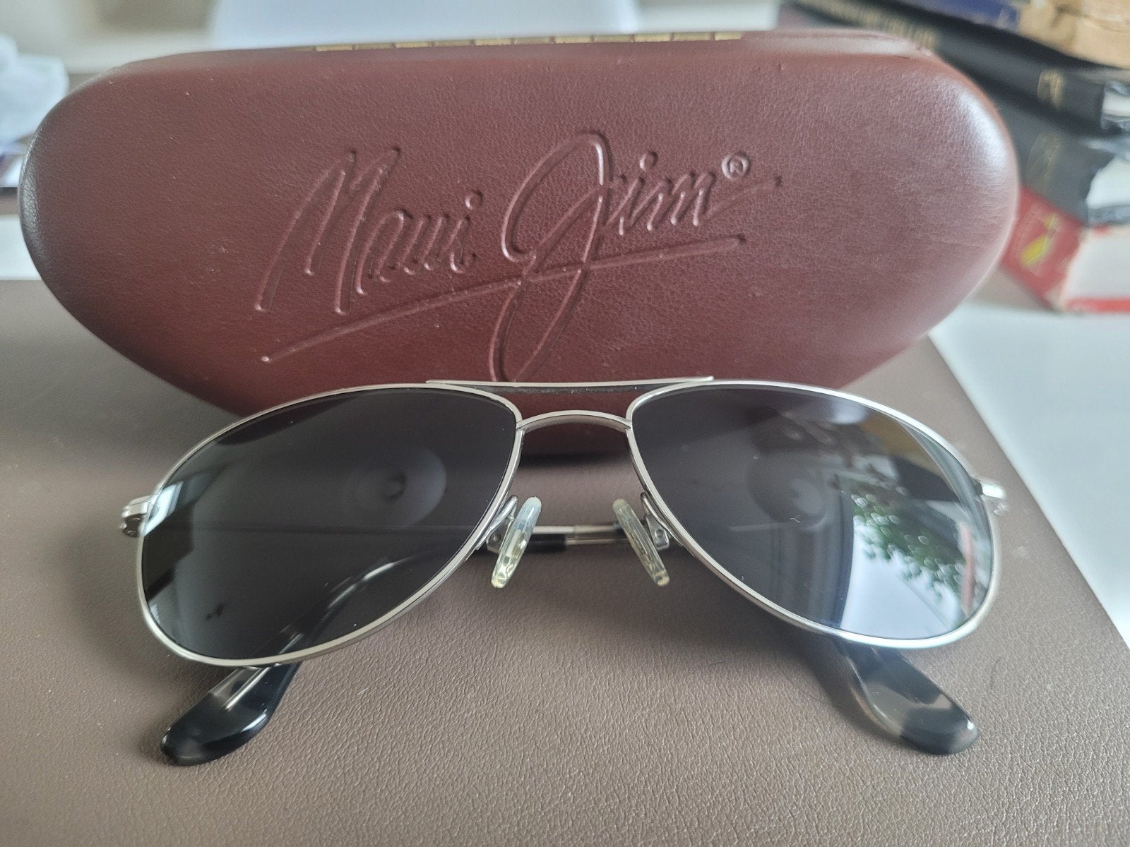 Maui Jim zonnebril van titanium, Sieraden, Tassen en Uiterlijk, Zonnebrillen en Brillen | Dames, Overige merken, Zonnebril, Ophalen of Verzenden