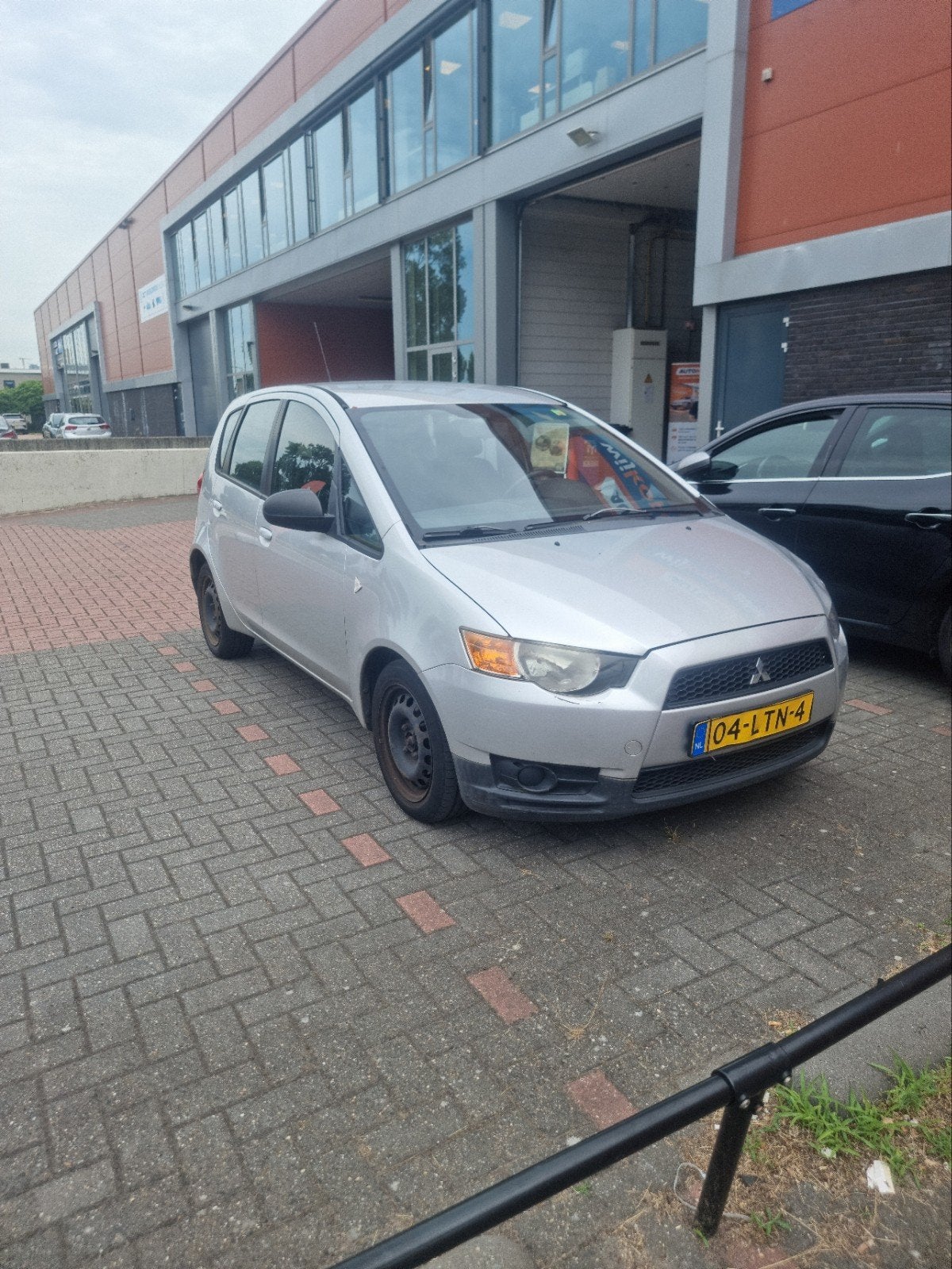 Mitsubishi Colt 1.1 5-DR 2010 Grijs, Auto's, Mitsubishi, 74 pk, Colt, Origineel Nederlands, Handgeschakeld