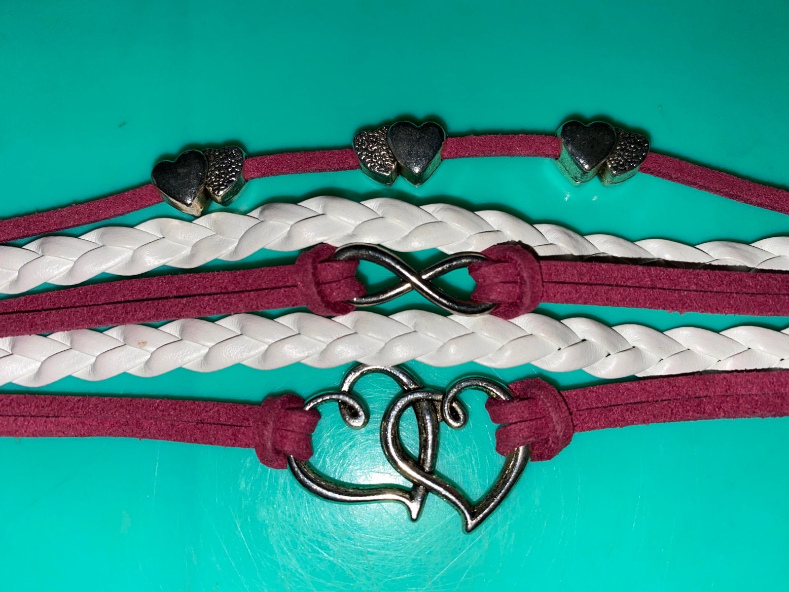 Armband met hartjes en oneindigheidsteken, Overige materialen, Wit, Ophalen of Verzenden, Zo goed als nieuw