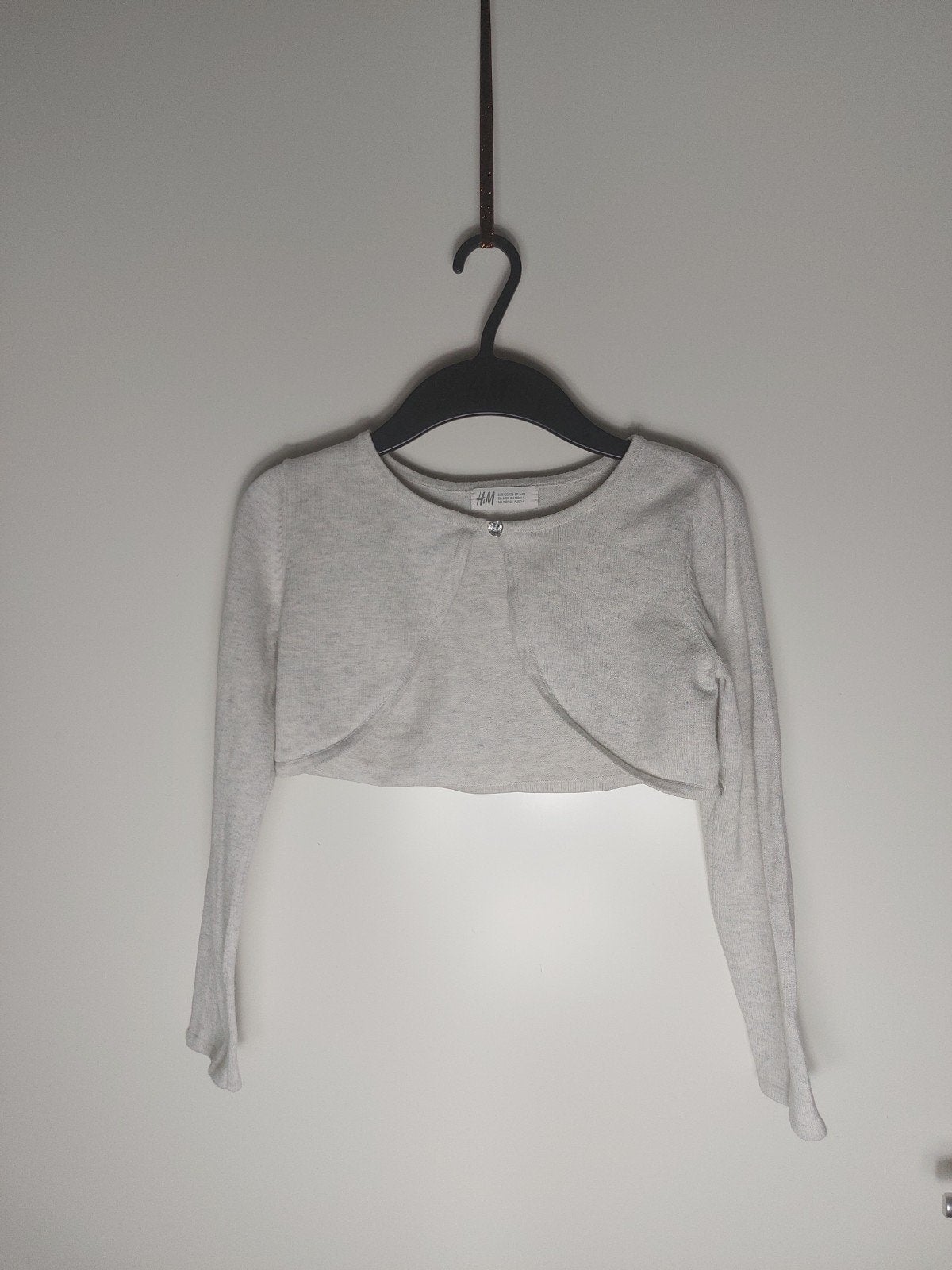 H&M bolero maat 122-128 z.g.a.n., Kinderen en Baby's, Kinderkleding | Maat 122, Meisje, Trui of Vest, H&M, Ophalen of Verzenden
