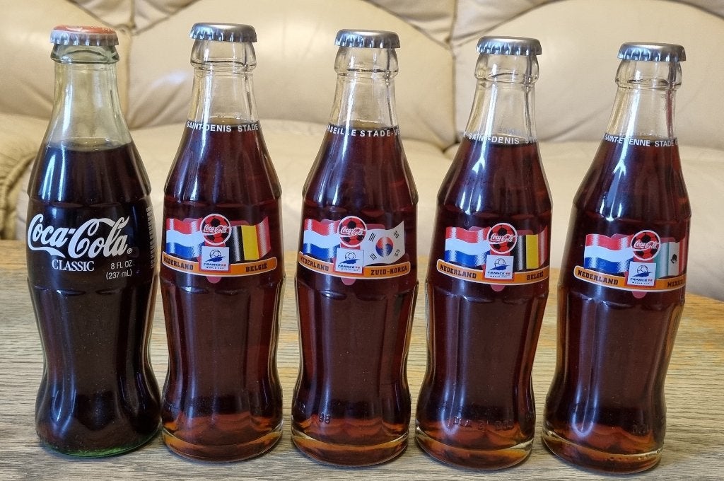 5 Coca cola flessen met inhoud WK voetbal 1998., Ophalen of Verzenden, Nieuw, Overige typen