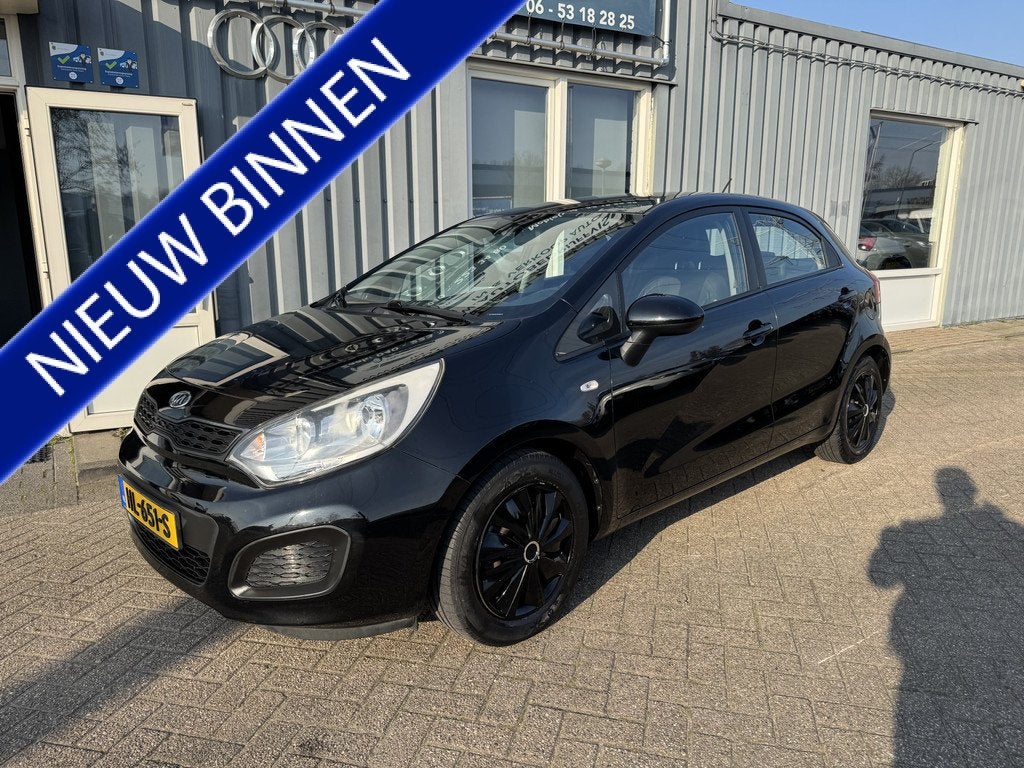 Kia Rio 1.2 CVVT ComfortLine (bj 2014), Auto's, Kia, Voorwielaandrijving, Zwart, 4 cilinders, Zwart