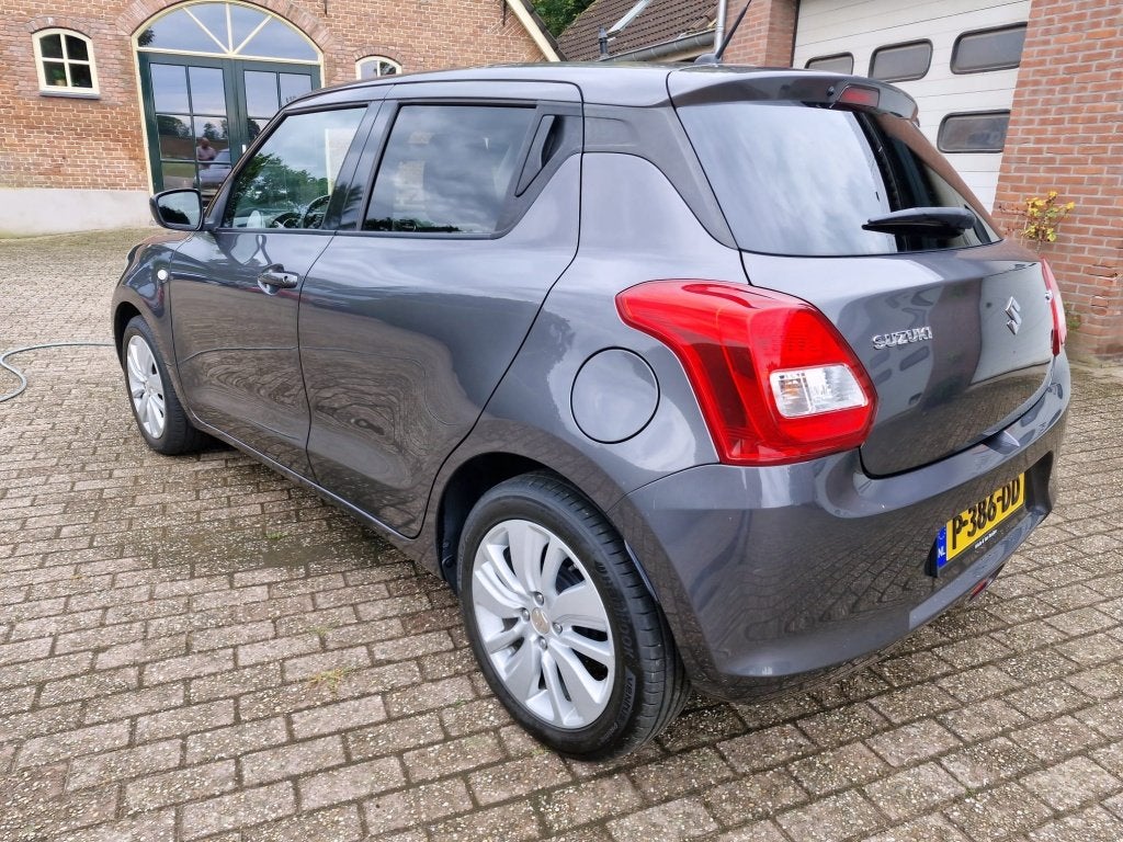 Suzuki Swift 1.0 Boosterjet (bj 2018), Auto's, Stof, Gebruikt, Euro 6, 840 kg