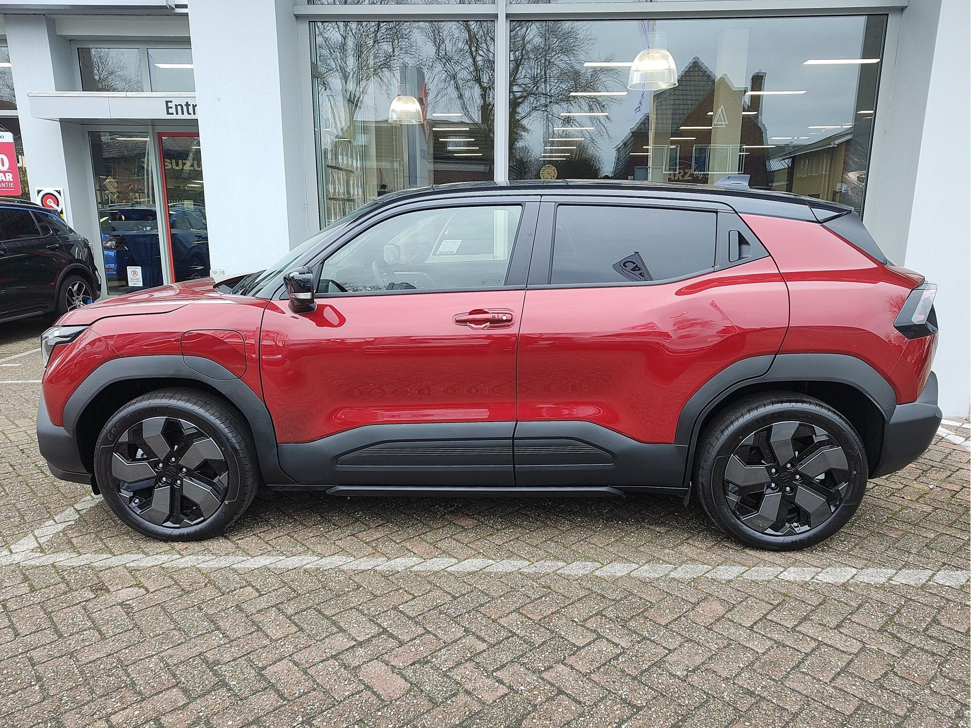 Suzuki e Vitara STYLE ALLGRIPP-E 61 kWh | DEMO DEAL! | Garan, Automaat, 12 maanden, Leder en Stof, Origineel Nederlands