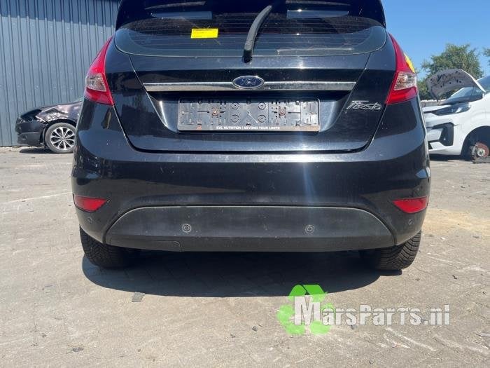 Achterbumper van een Ford Fiesta, Gebruikt, -, -, Ophalen of Verzenden