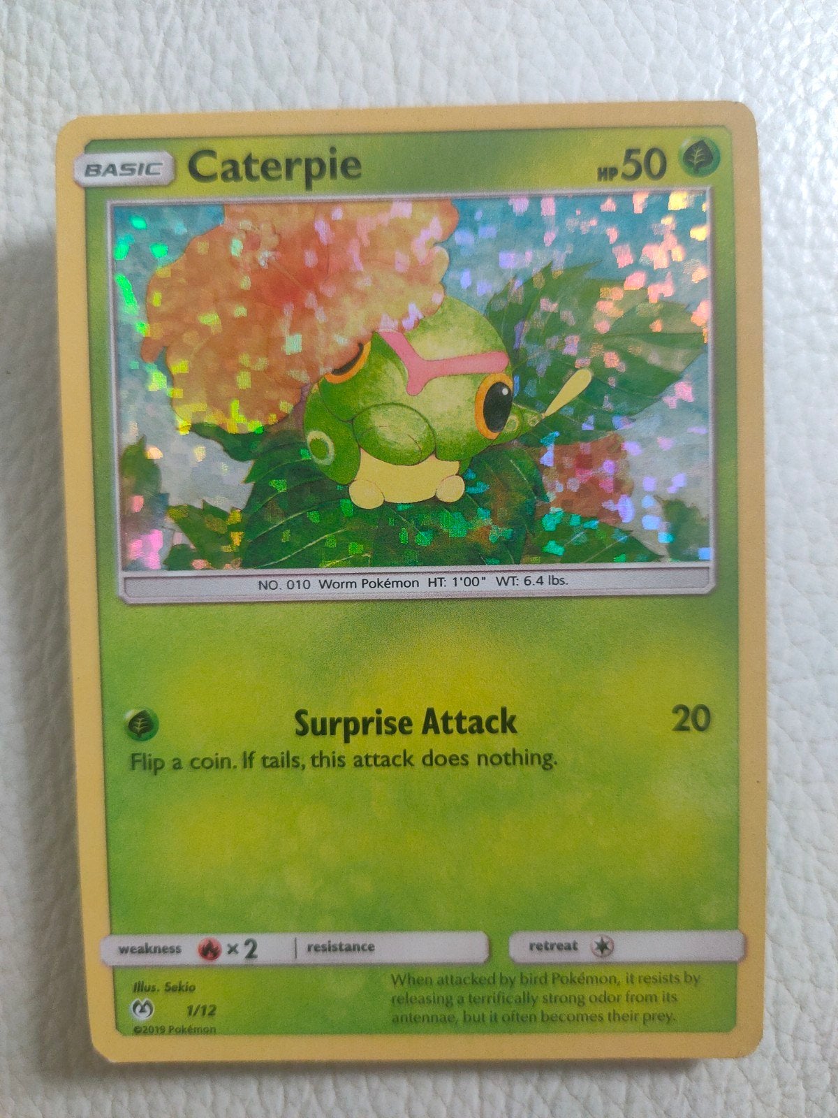 Caterpie 1/12 Reverse Holo  Detective Pikachu - Pokémon Kaar, Ophalen of Verzenden, Zo goed als nieuw
