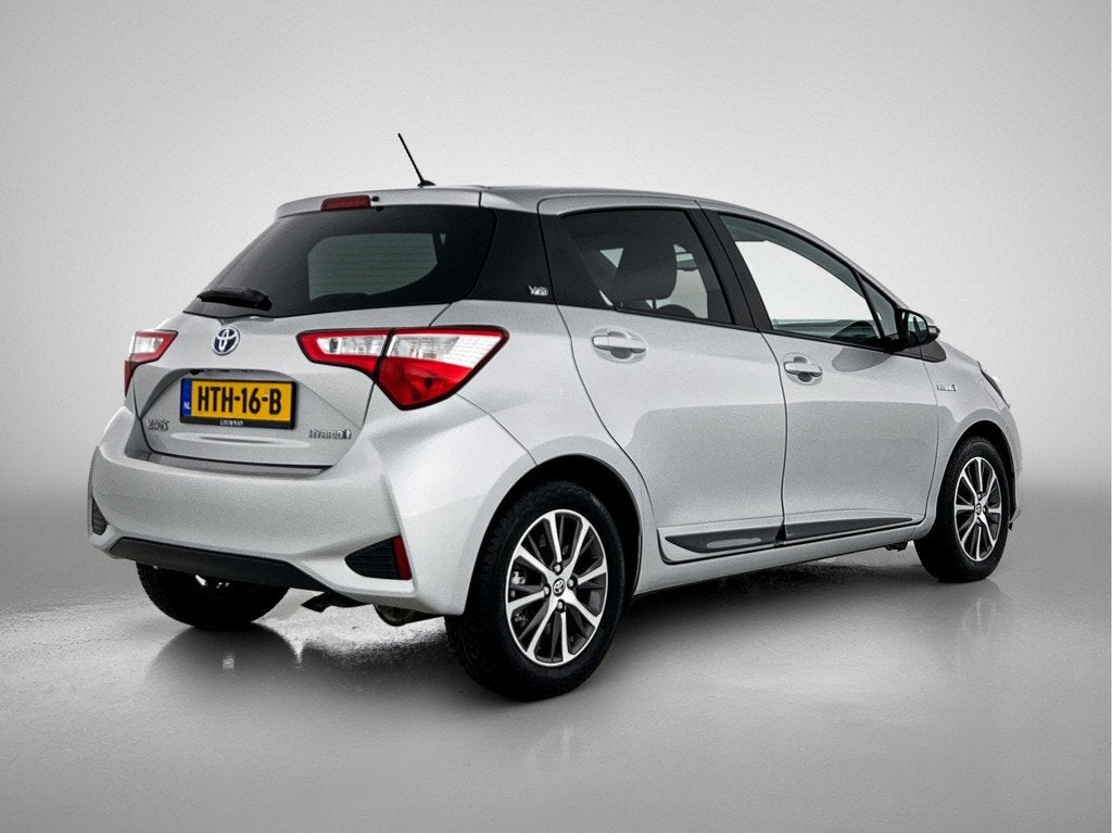 Toyota Yaris 1.5 Hybrid Y20 Limited | Achteruitrijcamera | M, Auto's, Toyota, 12 maanden, Gebruikt, Euro 6, 4 cilinders