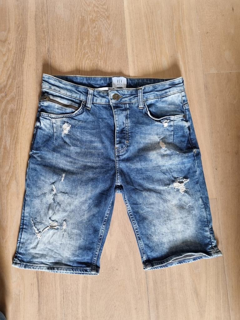 Jeans korte broek "Revelation"
Blauwe spijker korte broek ,, Blauw, W32 (confectie 46) of kleiner, Ophalen of Verzenden, Zo goed als nieuw