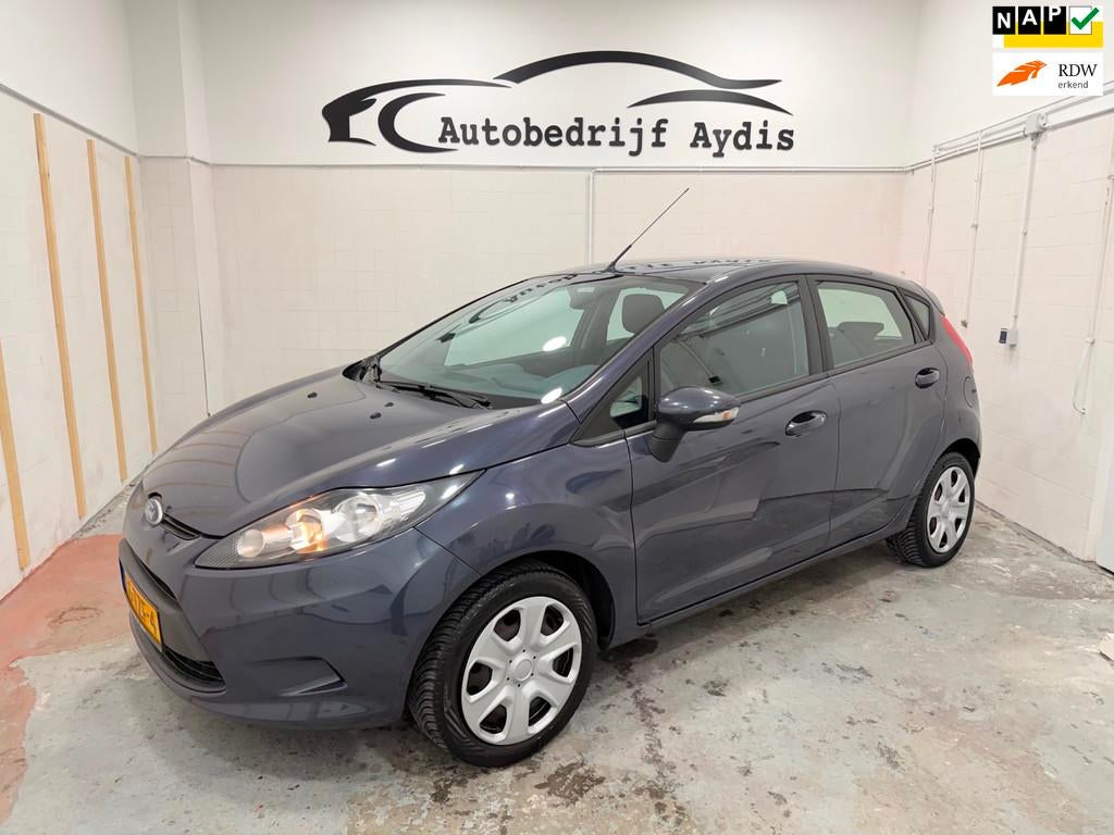 Ford Fiesta 1.25 Champion Airco EL Ramen 5Deurs Aux, Voorwielaandrijving, Euro 5, Stof, 1242 cc