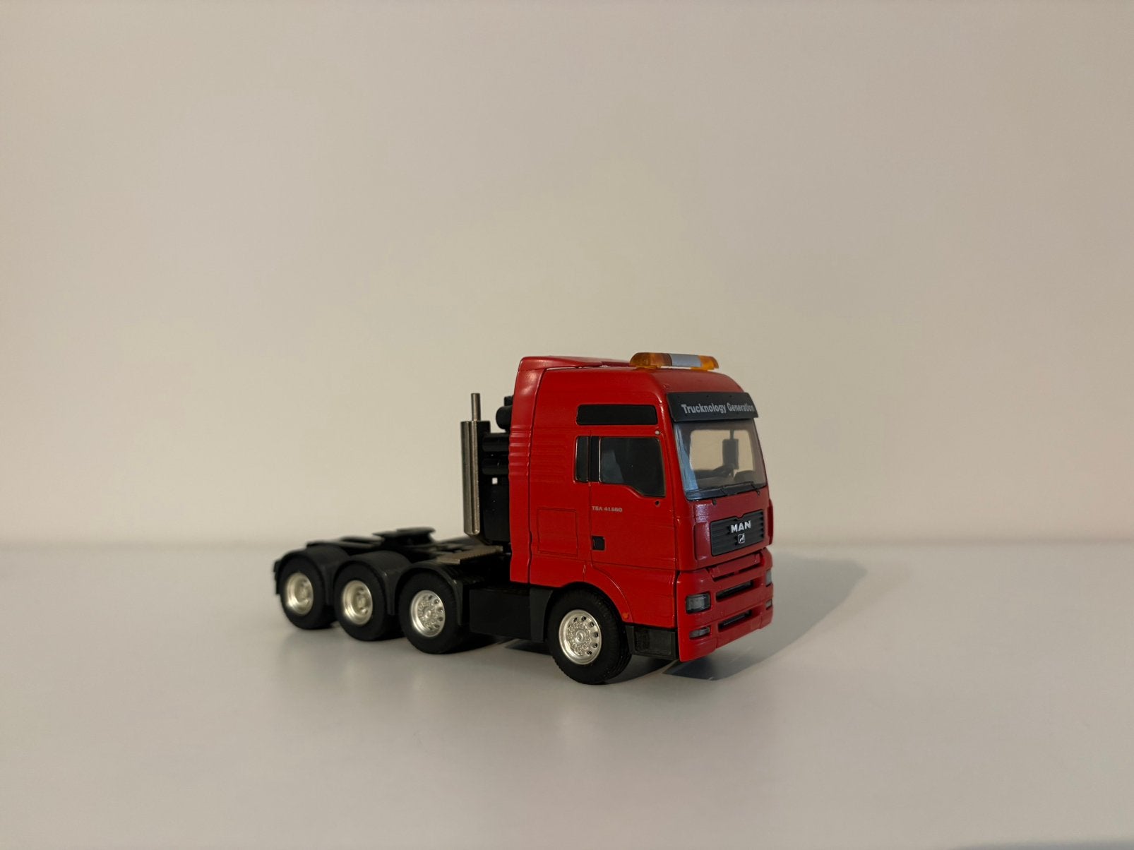 MAN Commander 4 assige trekker Conrad, Hobby en Vrije tijd, Modelauto's | 1:50, Verzenden, Zo goed als nieuw, Bus of Vrachtwagen