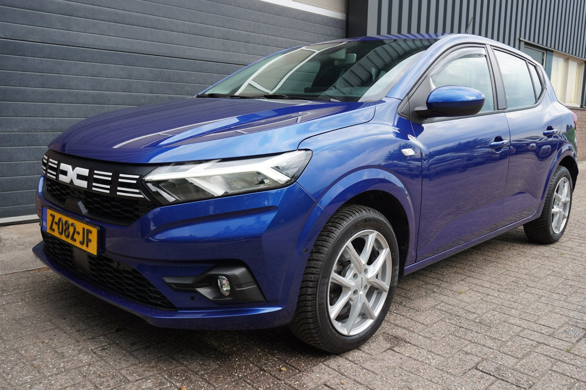 Dacia Sandero 1.0 TCe 90PK Essential 12mnd garantie / Naviga, Auto's, Voorwielaandrijving, Stof, Blauw, Bedrijf
