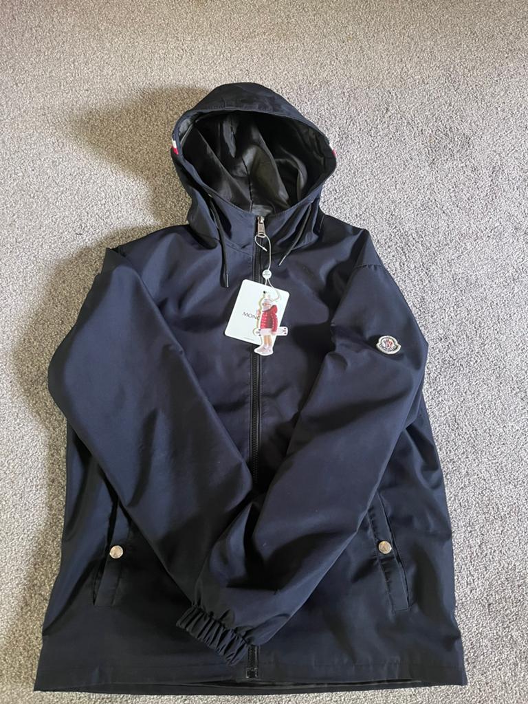 Moncler jas maat L - met labels, Ophalen of Verzenden, Gedragen, Maat 52/54 (L), Blauw