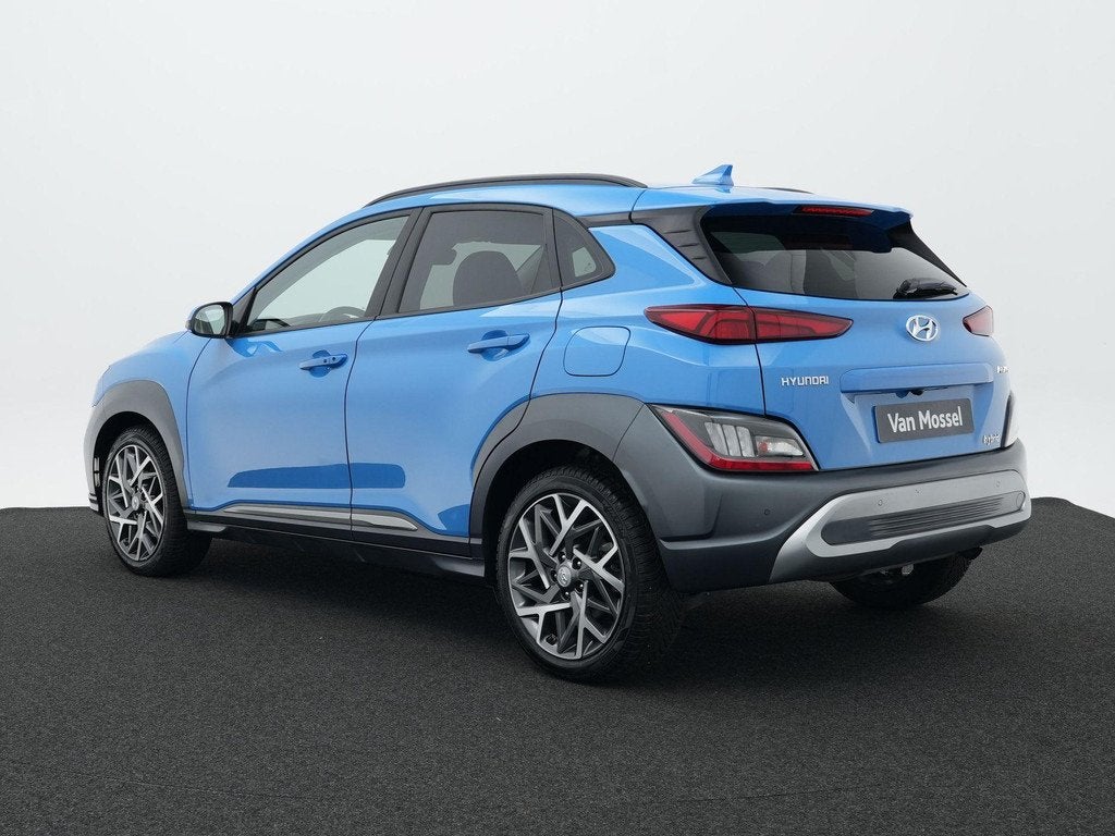 Hyundai Kona 1.6 GDI HEV Fashion Design Sky | Achteruitrijca, Auto's, Hyundai, 12 maanden, Gebruikt, Blauw, Leder en Stof