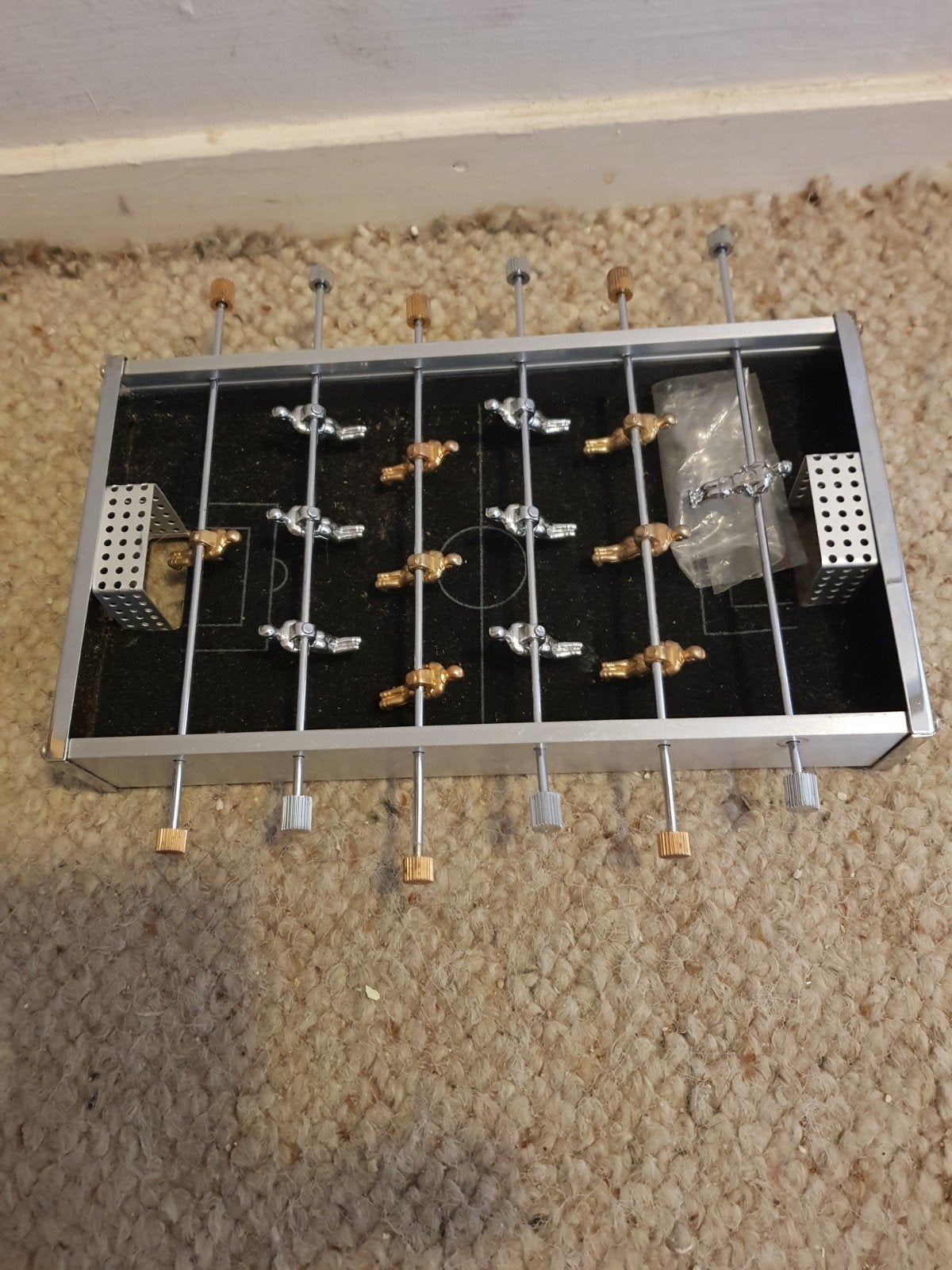 Tafel voetbalspel., Ophalen
