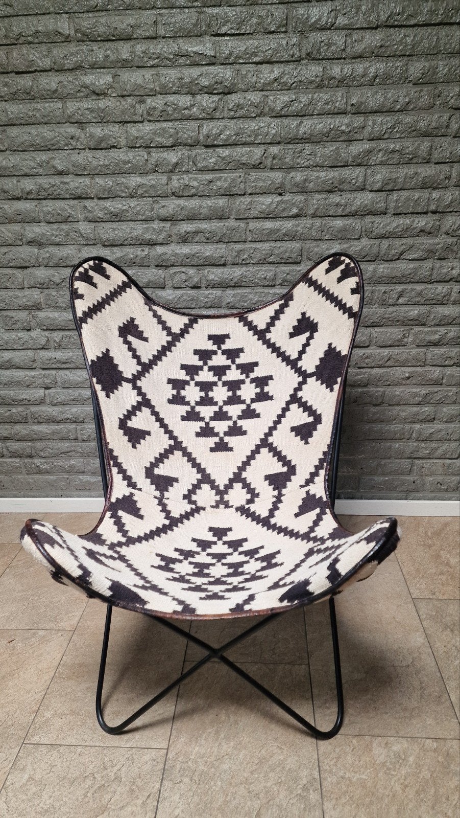 Vlinderstoel zwart/gebroken wit met vintage leer, Huis en Inrichting, Stoelen, Gebruikt, Vintage, Modern, Bohemian, Zwart, Ophalen of Verzenden