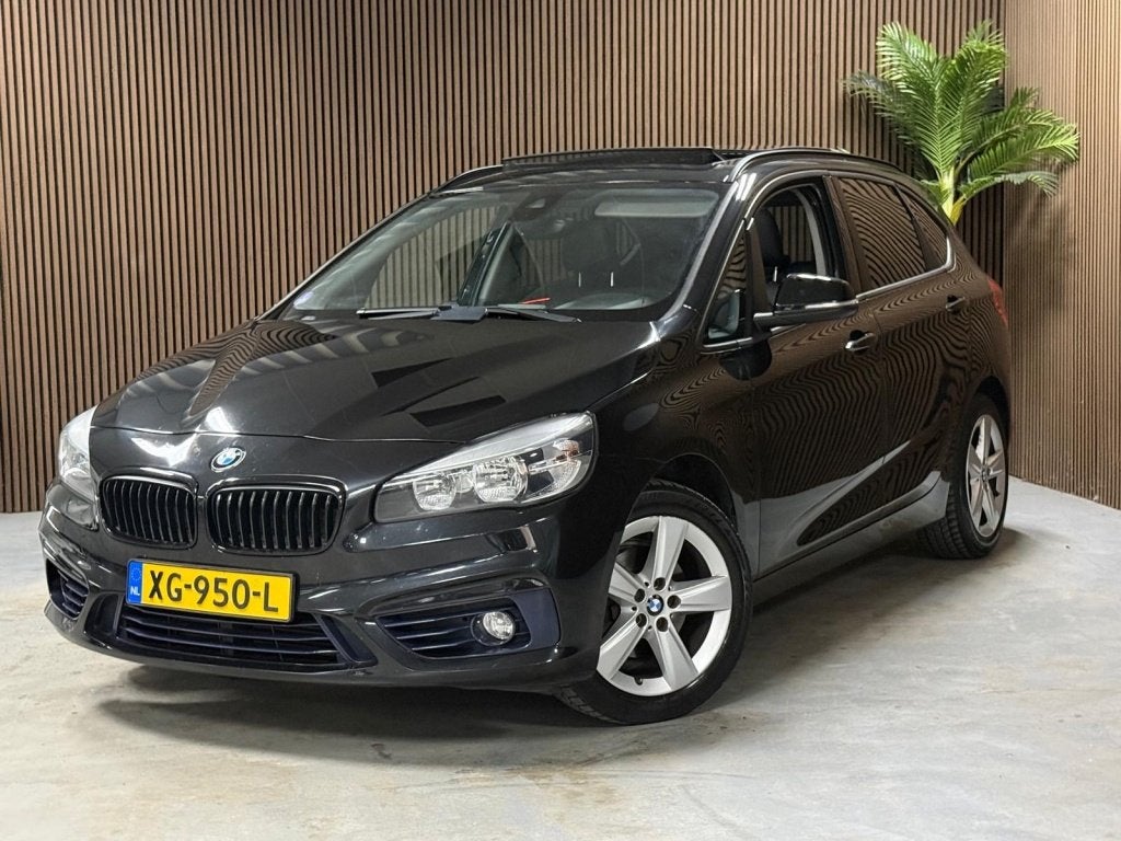 BMW 2 Serie Active Tourer 218i High Executive (bj 2015), Auto's, Voorwielaandrijving, 136 pk, Gebruikt, Zwart