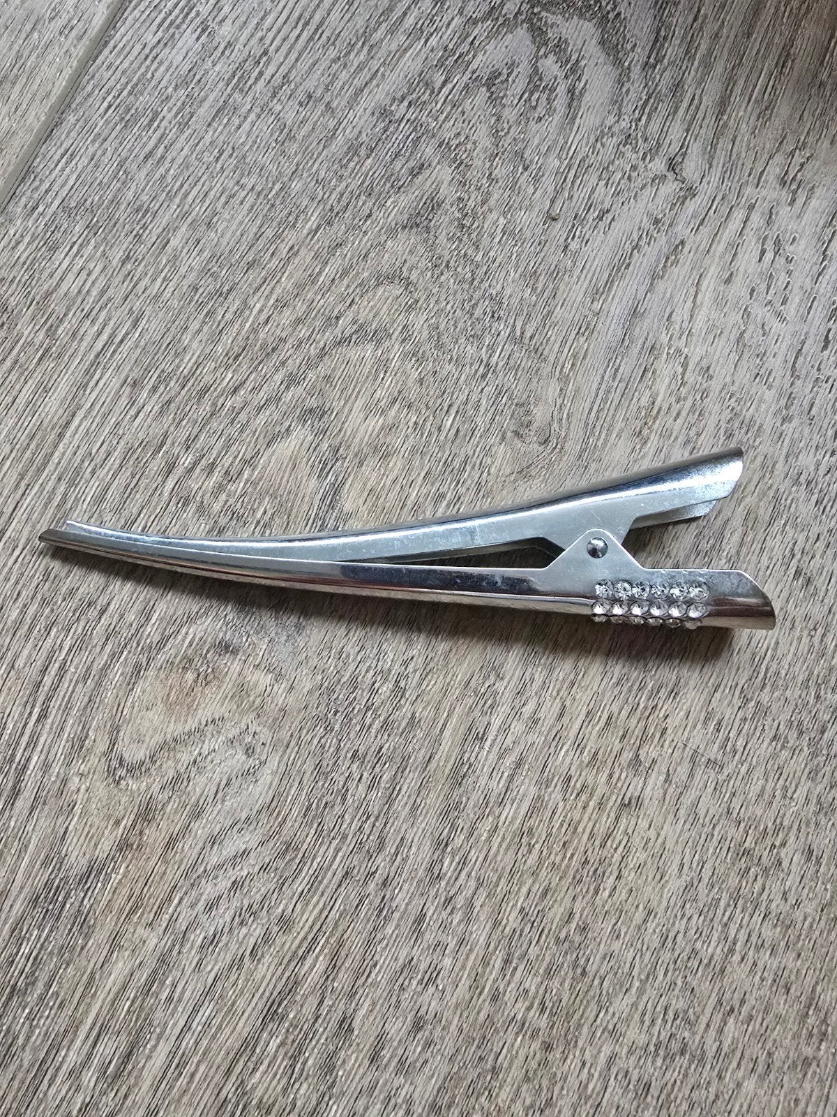 Te koop zilverkleurige haarklem., Ophalen of Verzenden, Nieuw, Haarspeld
