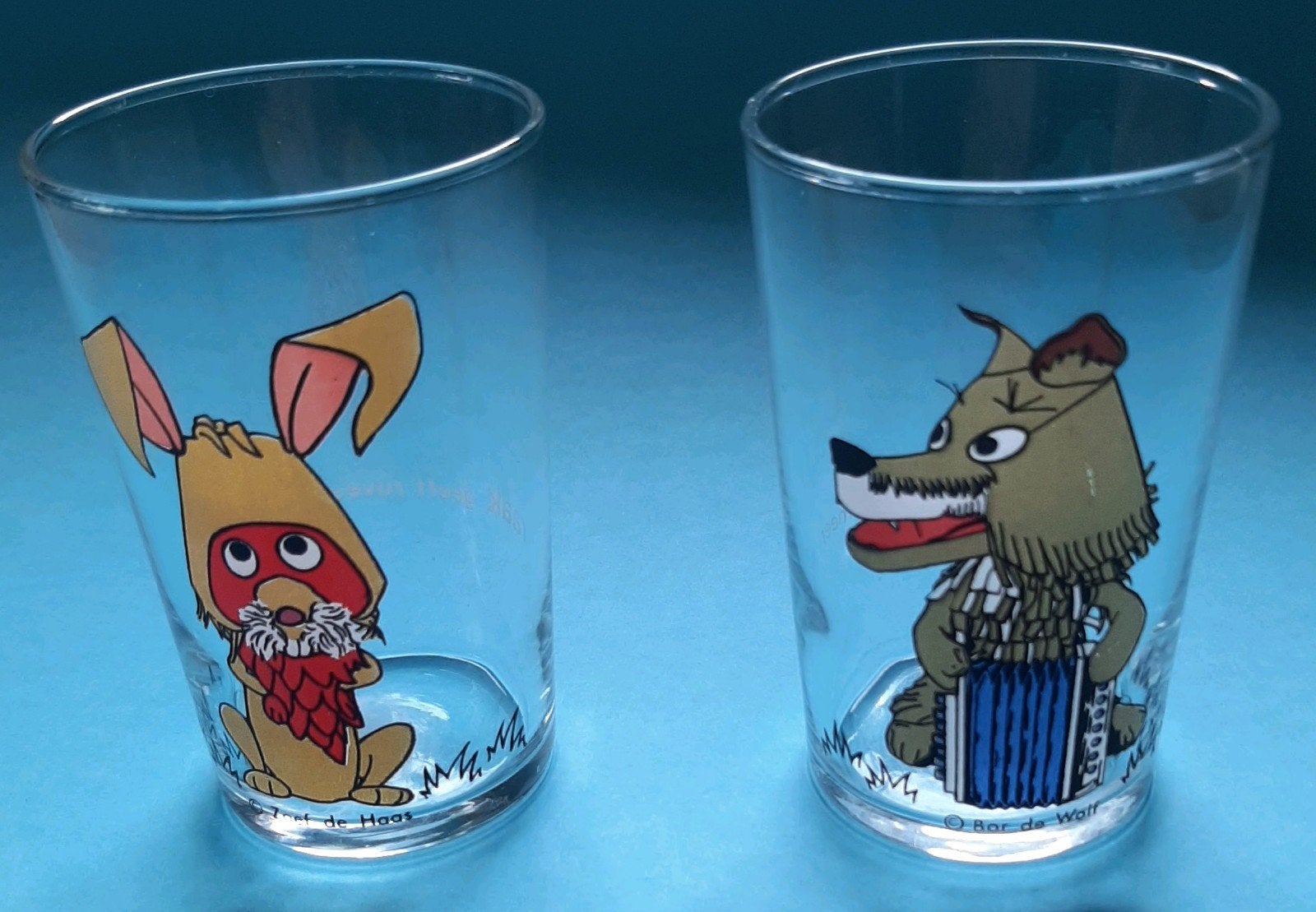 2 vintage Fabeltjeskrant glazen van Raak - Vintage, Ophalen of Verzenden, Gebruikt