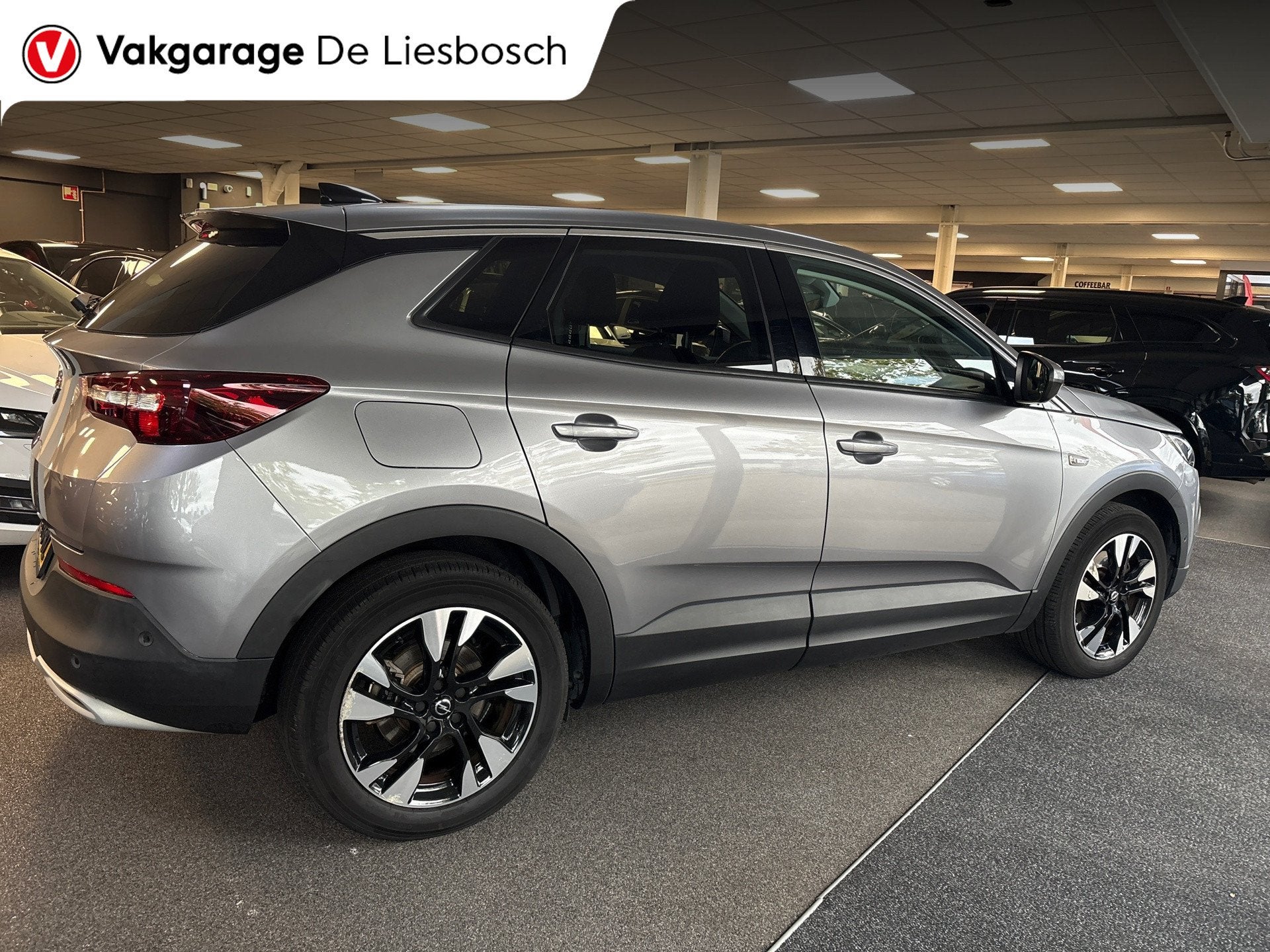 Opel Grandland X 1.6 Turbo Hybrid Business Elegance/navi/cam, Auto's, Stof, 4 cilinders, Bedrijf, Verwarmde buitenspiegels