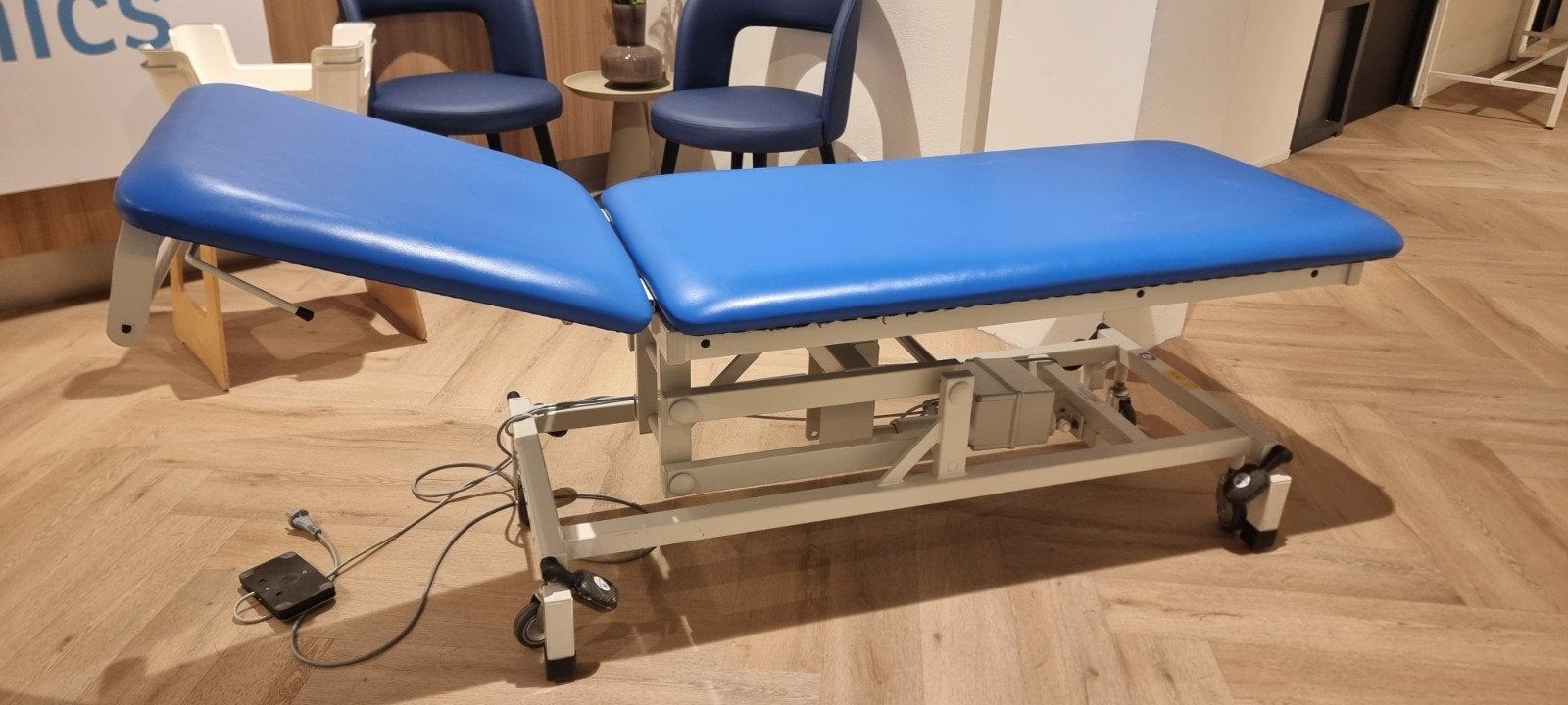 elektrisch verstelbare behandbank, Ophalen