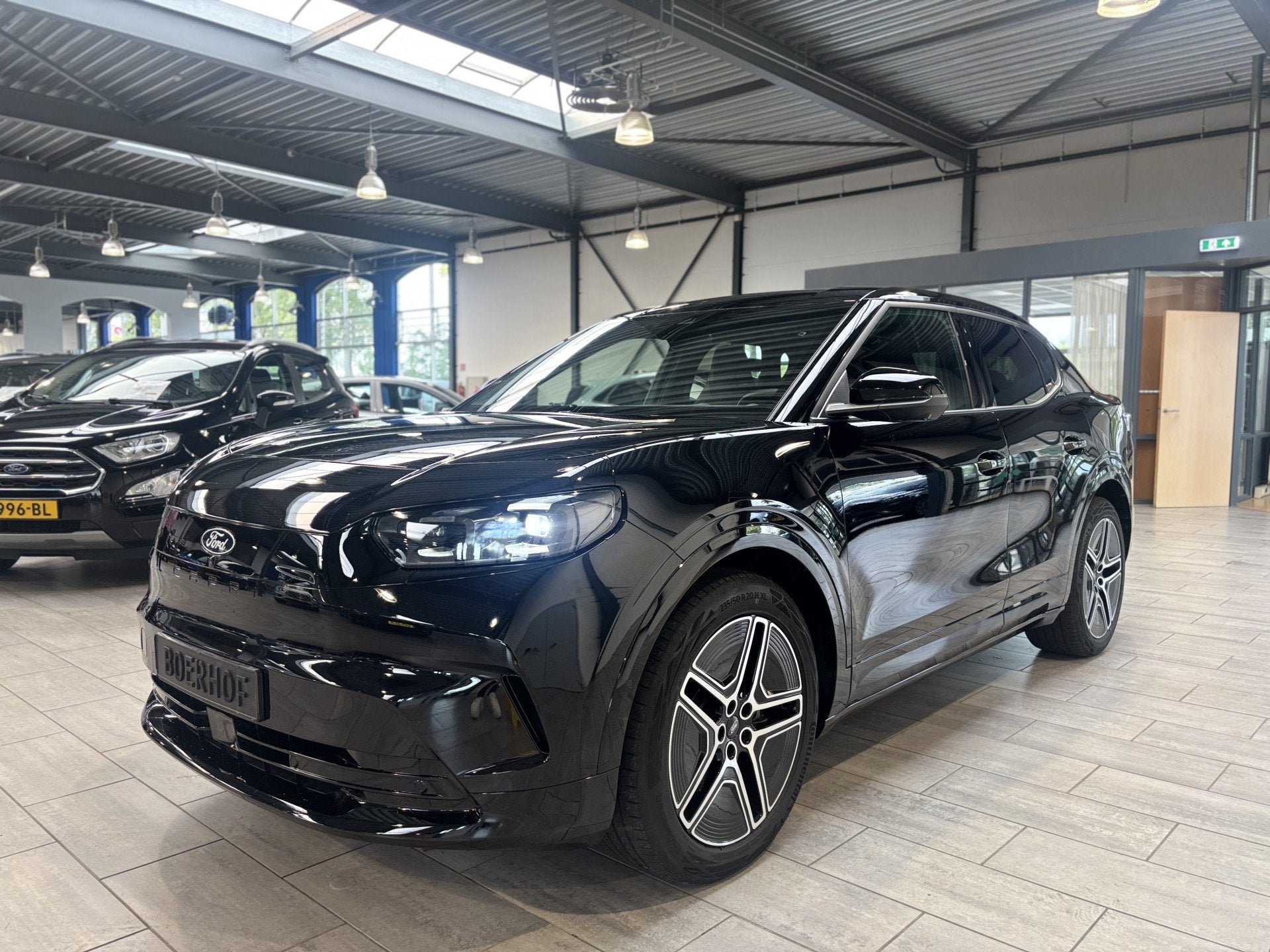 Ford Capri Premium Standard Range RWD 52 kWh 190pk | Warmte, Auto's, Dealer onderhouden, Achterwielaandrijving, Gebruikt, 190 pk