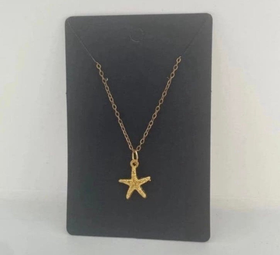 Goudkleurige ketting met zeester hanger - Nieuw, Verzenden, Nieuw, Goud, Met hanger