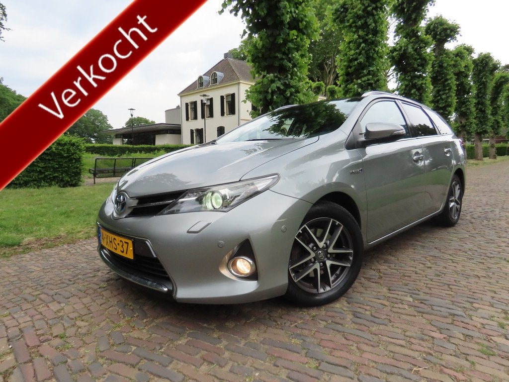 Toyota Auris Touring Sports 1.8 Hybrid Lease Exclusive Leer, Euro 5, Gebruikt, Zwart, Hybride Elektrisch/Benzine