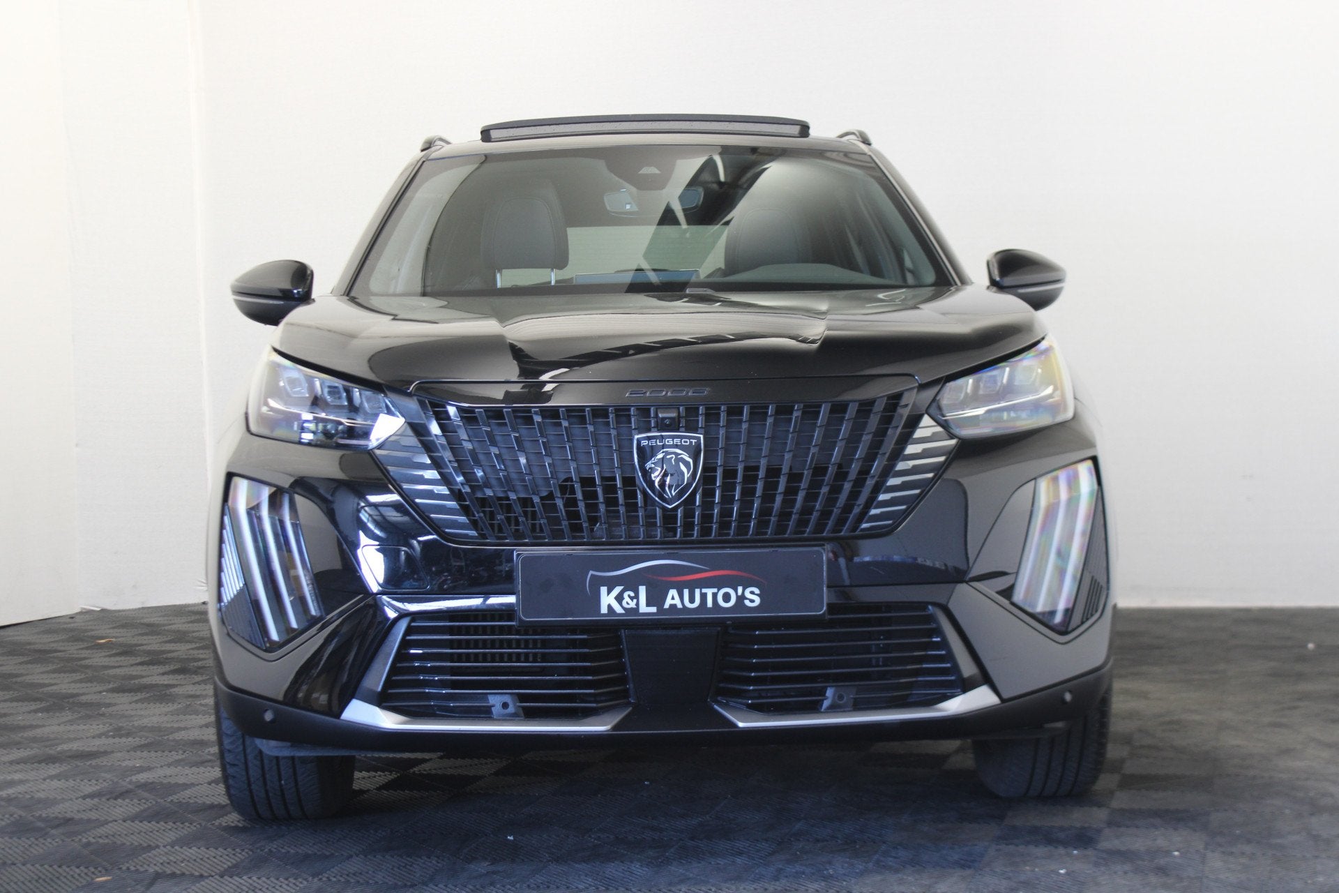 Peugeot 2008 1.2 PureTech 130 GT |Schuifdak|Camera|, Auto's, Gebruikt, Leder en Stof, Zwart, 1180 kg