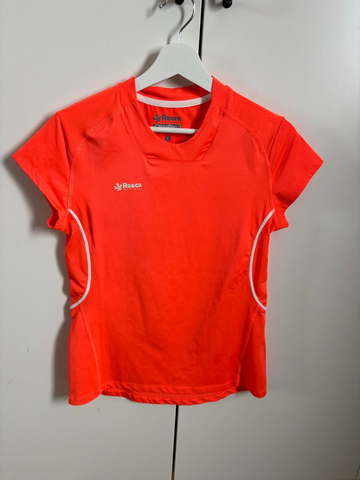 Reece sportshirt maat L (valt klein), Maat 38/40 (M), Oranje, Ophalen of Verzenden, Zo goed als nieuw