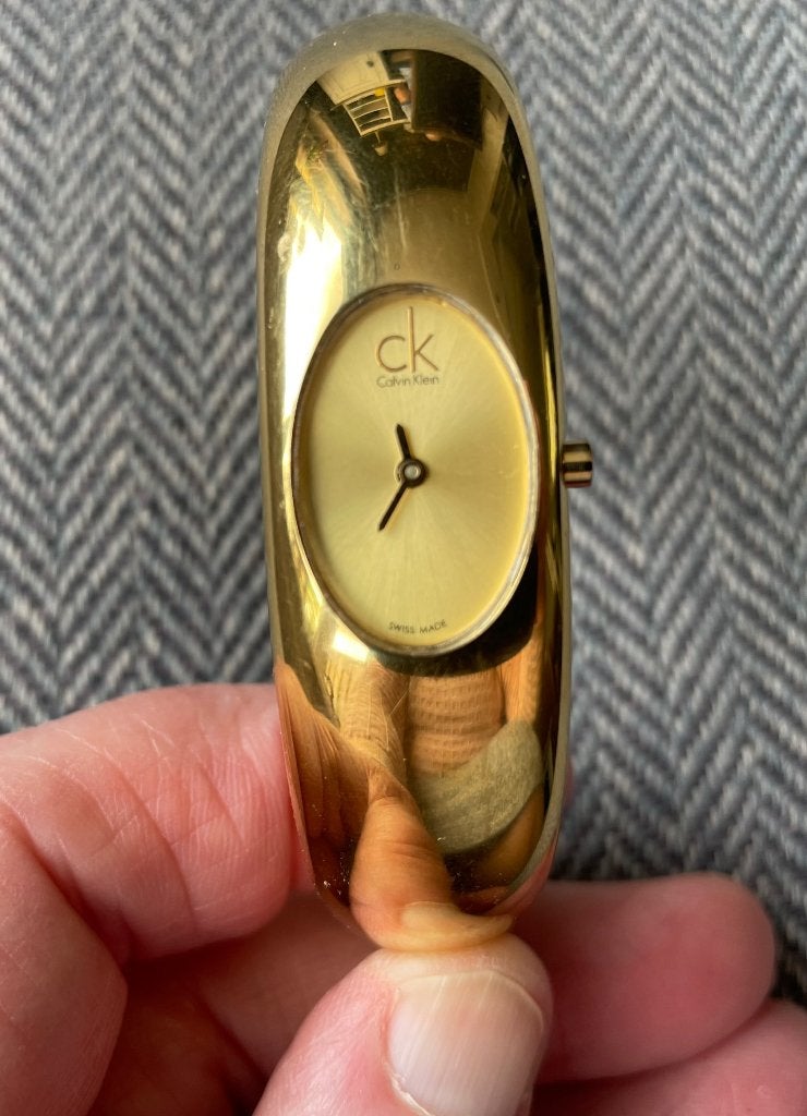 verguld DAMESHORLOGE CALVIN KLEIN goed werkend - WD014, Gebruikt, Polshorloge, Ophalen of Verzenden, Woord en Daad