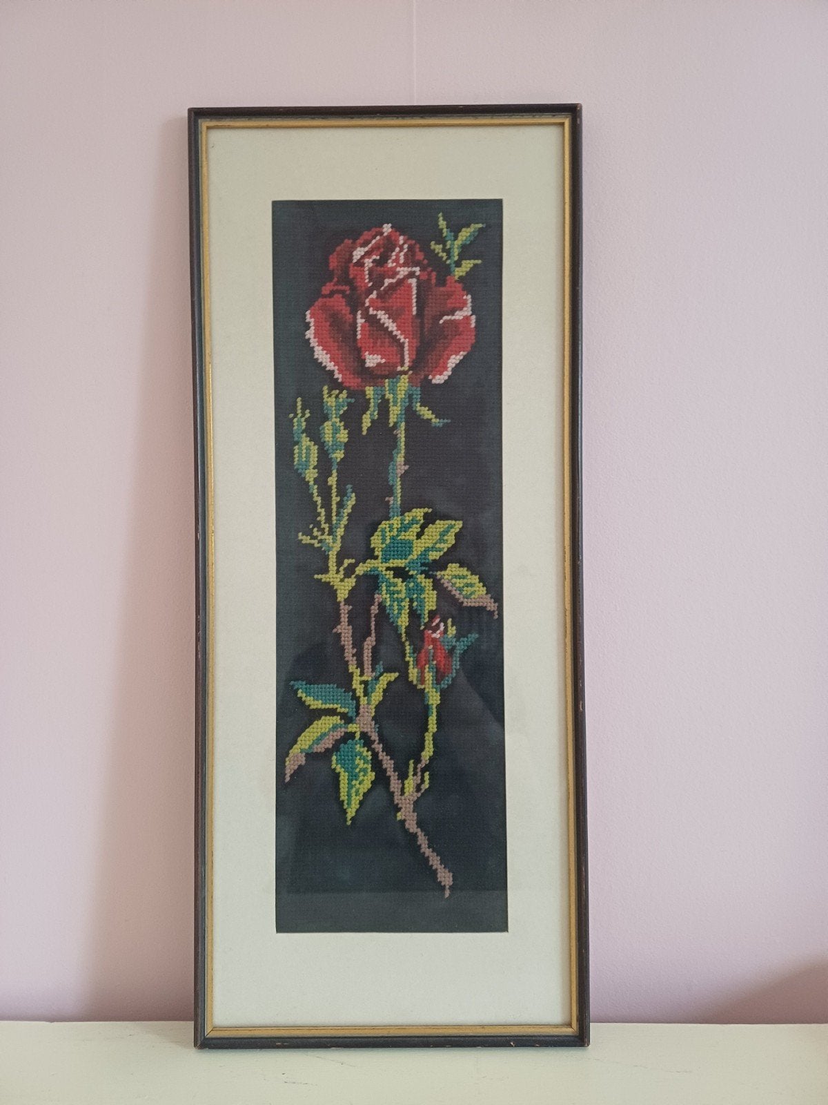 Geborduurd schilderij roos, Ophalen
