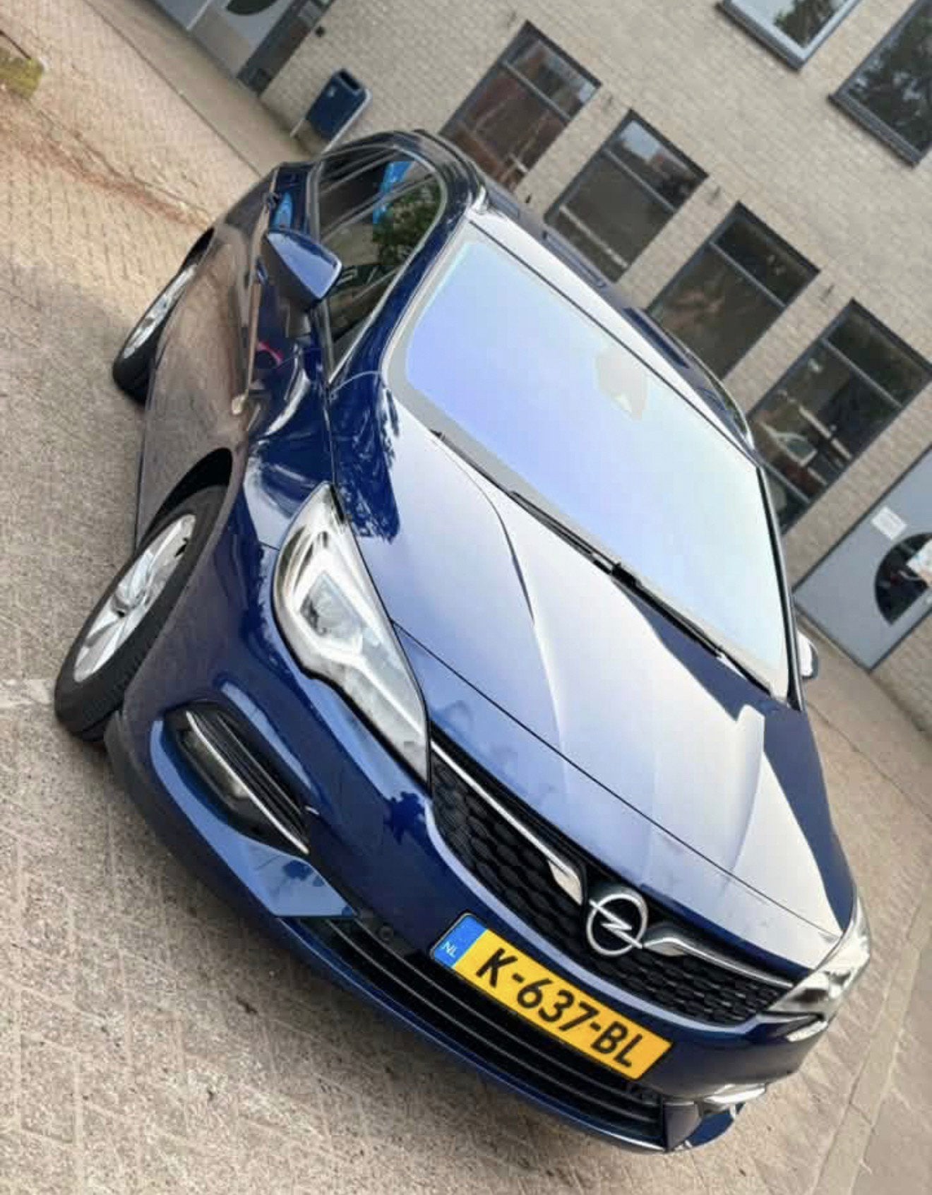 Opel Astra 2020 vol leder, massage st verwarming camera!, Auto's, Lichtsensor, Zwart, 1199 cc, Blauw