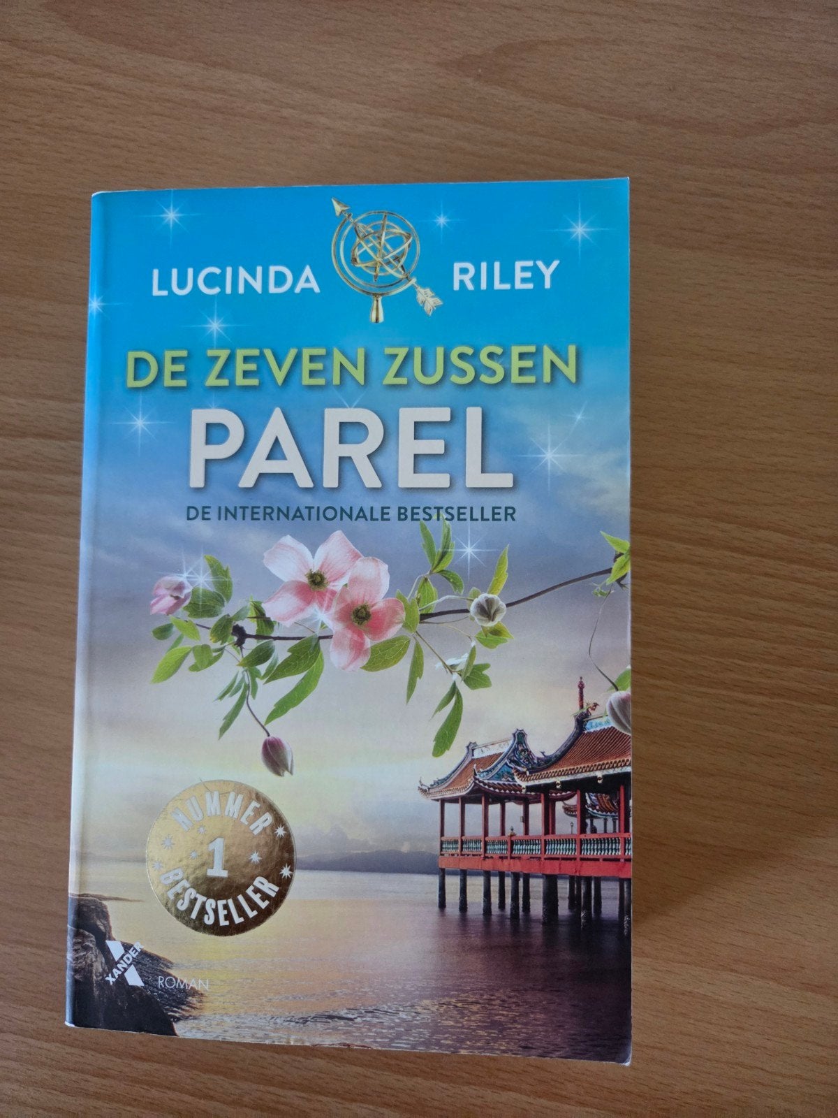 De Zeven Zussen: Parel - Lucinda Riley (Roman), Ophalen of Verzenden, Zo goed als nieuw, Lucinda Riley, Nederland