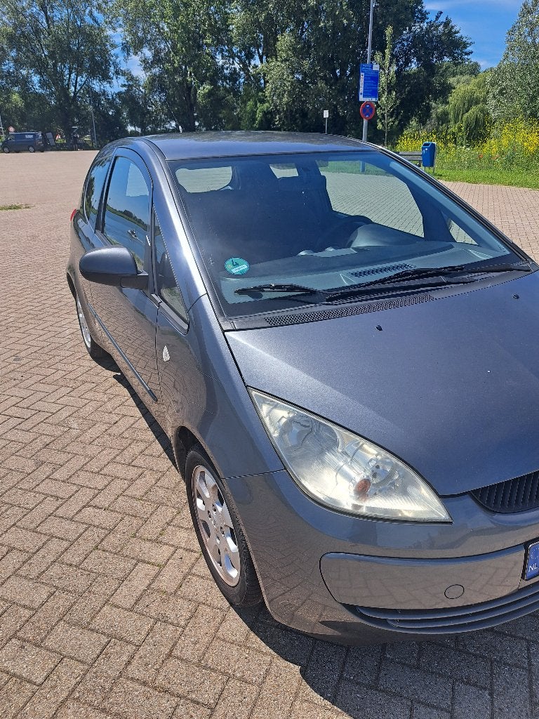Mitsubishi Colt 1.3 Mivec CZ3 AUT 2006 Grijs, Stof, Origineel Nederlands, Grijs, Particulier