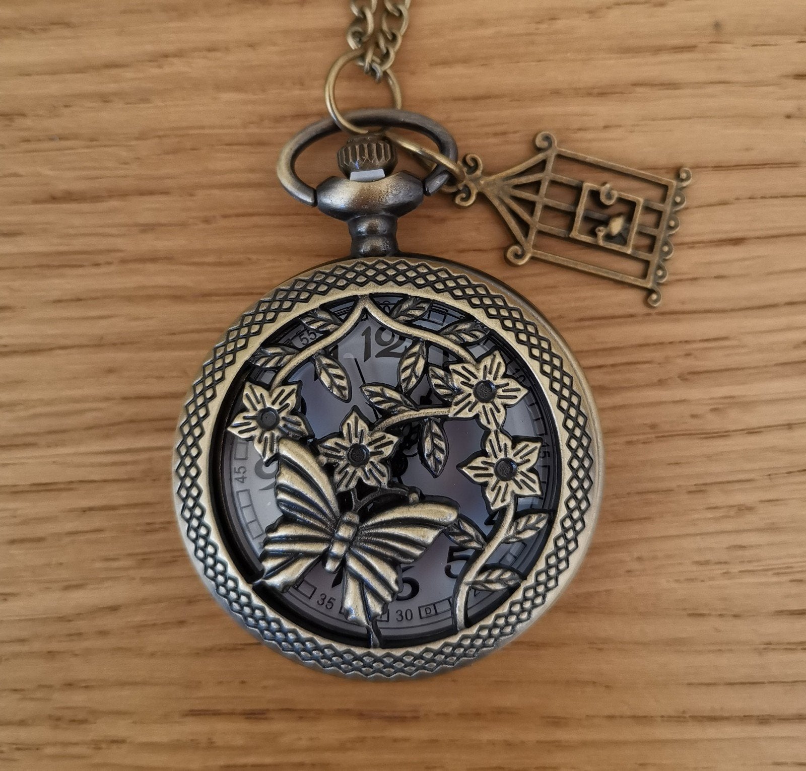 Goudkleurig horloge ketting met Vlinder, Bloem & Vogelkooi, Sieraden, Tassen en Uiterlijk, Horloges | Dames, Overige merken, Overige materialen