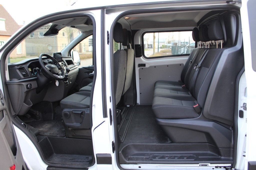 Ford Transit Custom 320 2.0 TDCI 130PK Euro6 L2H1 Trend DC D, Auto's, Voorwielaandrijving, 4 cilinders, 2800 kg, Wit