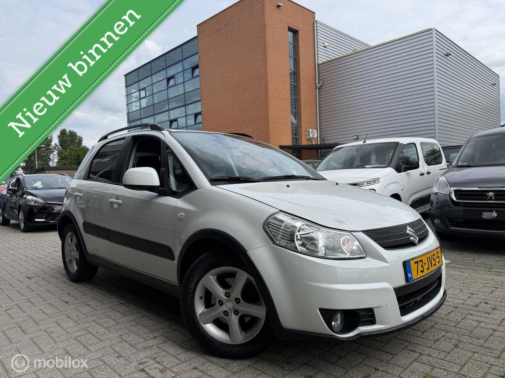 Suzuki SX4 1.6 Exclusive Parelmoer wit 1 jaar APK, Auto's, Suzuki, 15 km/l, Gebruikt, 4 cilinders, Automatische klimaatregeling