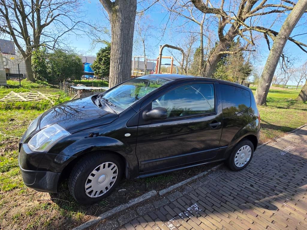 Citroën C2 1.1 Zwart, Auto's, Citroën, Voorwielaandrijving, 450 kg, 525 kg, 31 €/maand