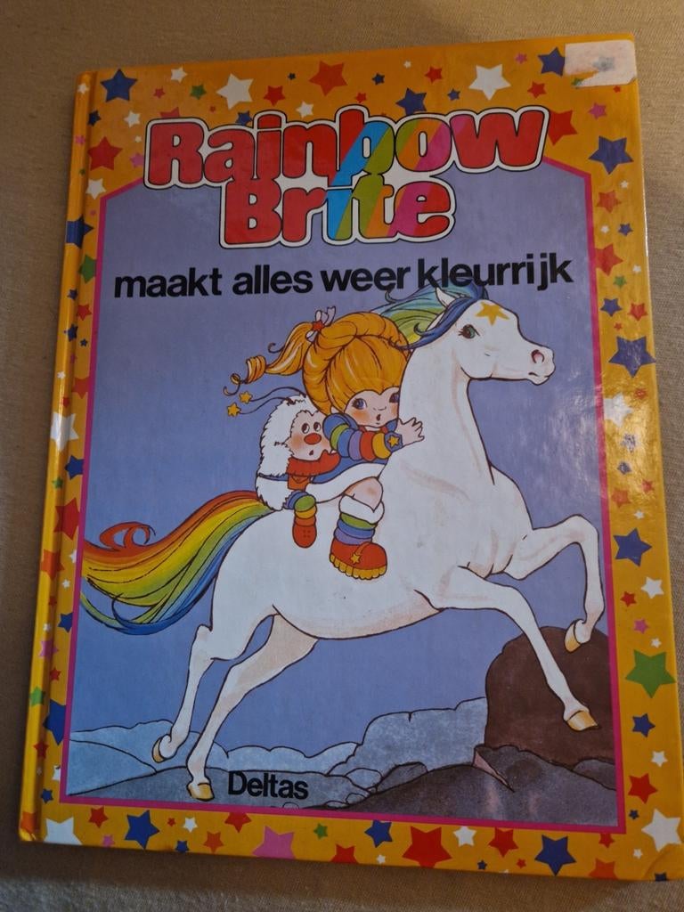 1984 rainbow brite boek maakt alles weer kleurrijk deltas, Ophalen of Verzenden