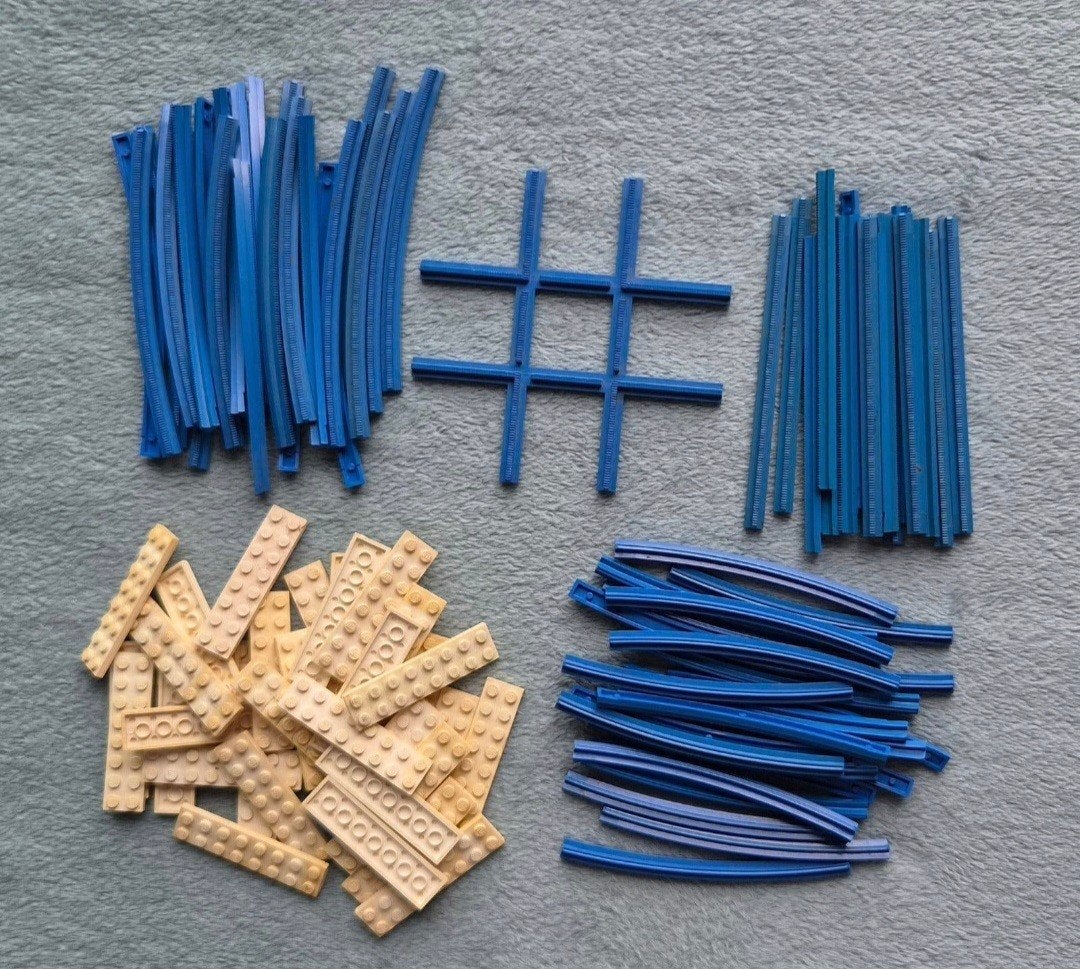 Lego trein 4,5 Volt blauwe rails + kruispunt en bielen., Ophalen of Verzenden, Gebruikt, Losse stenen, Lego