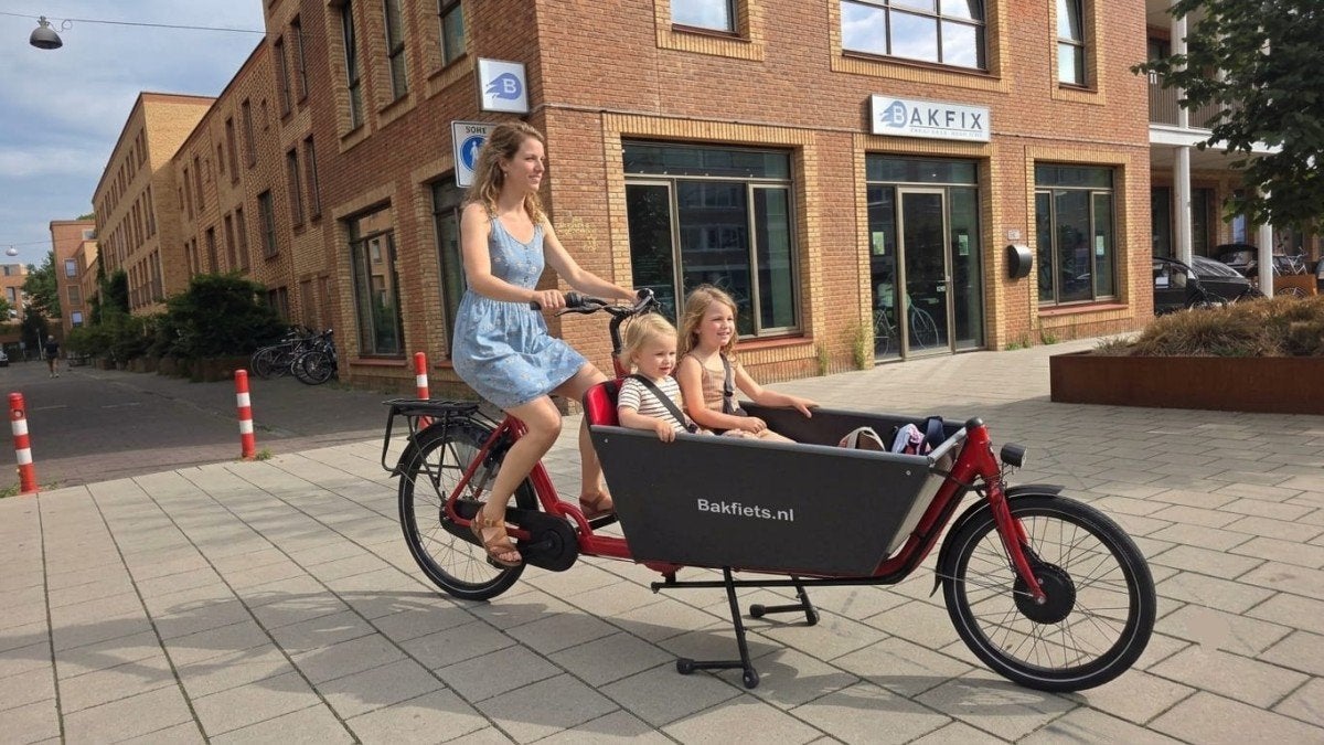 Elekteriche Bakfiets lang met tregentent