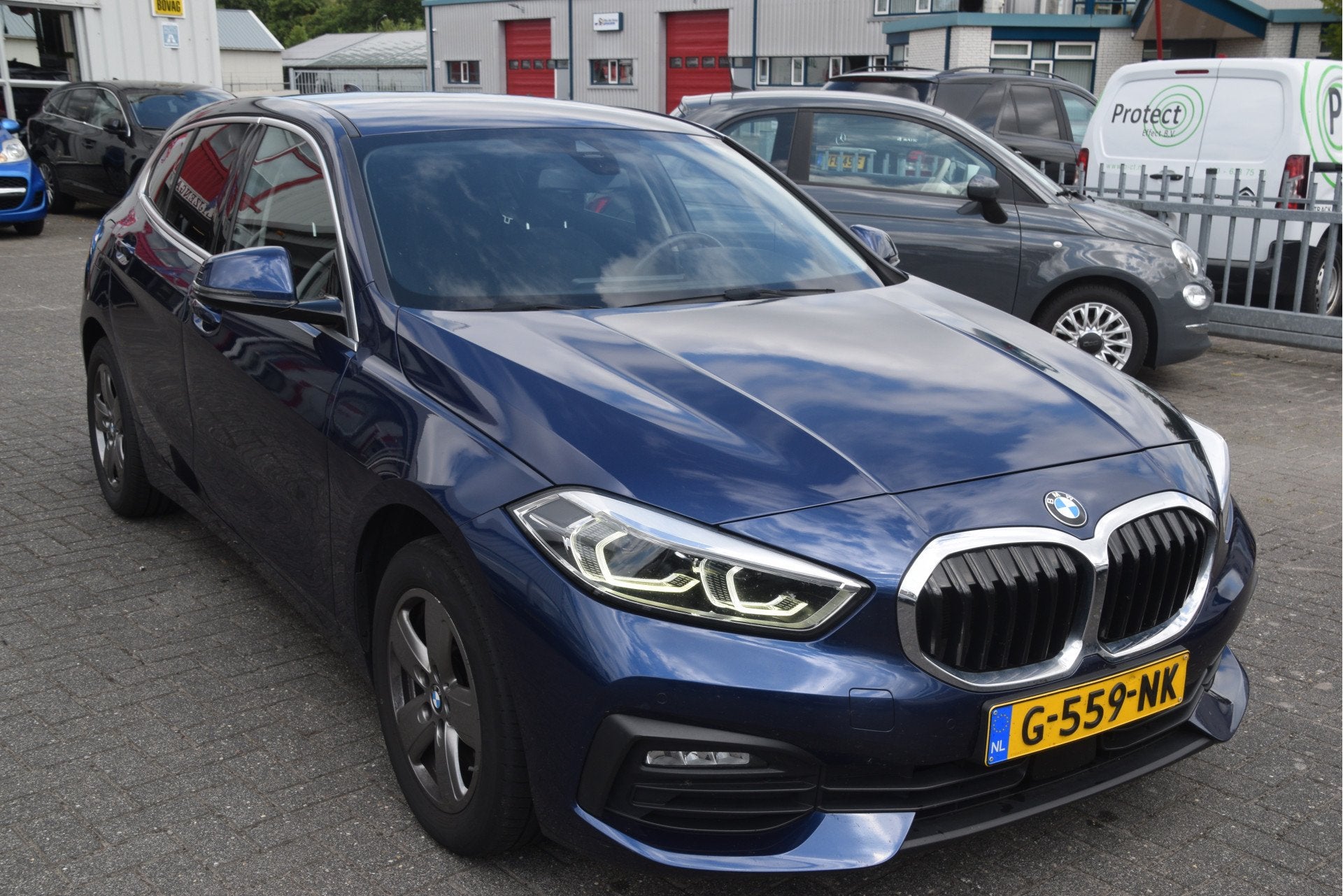 BMW 1-serie 118i Executive Edition LED | Virtual Cockpit | C, Auto's, Stof, Gebruikt, Met garantie (alle), Blauw