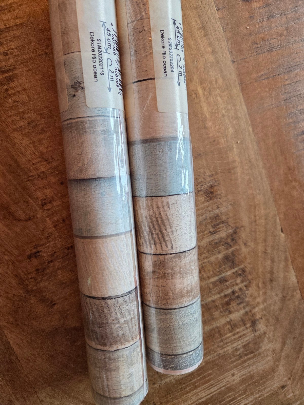 2 rollen dc-fix plakfolie, nieuw. Houtprint, kleur ocean, Ophalen of Verzenden, Nieuw