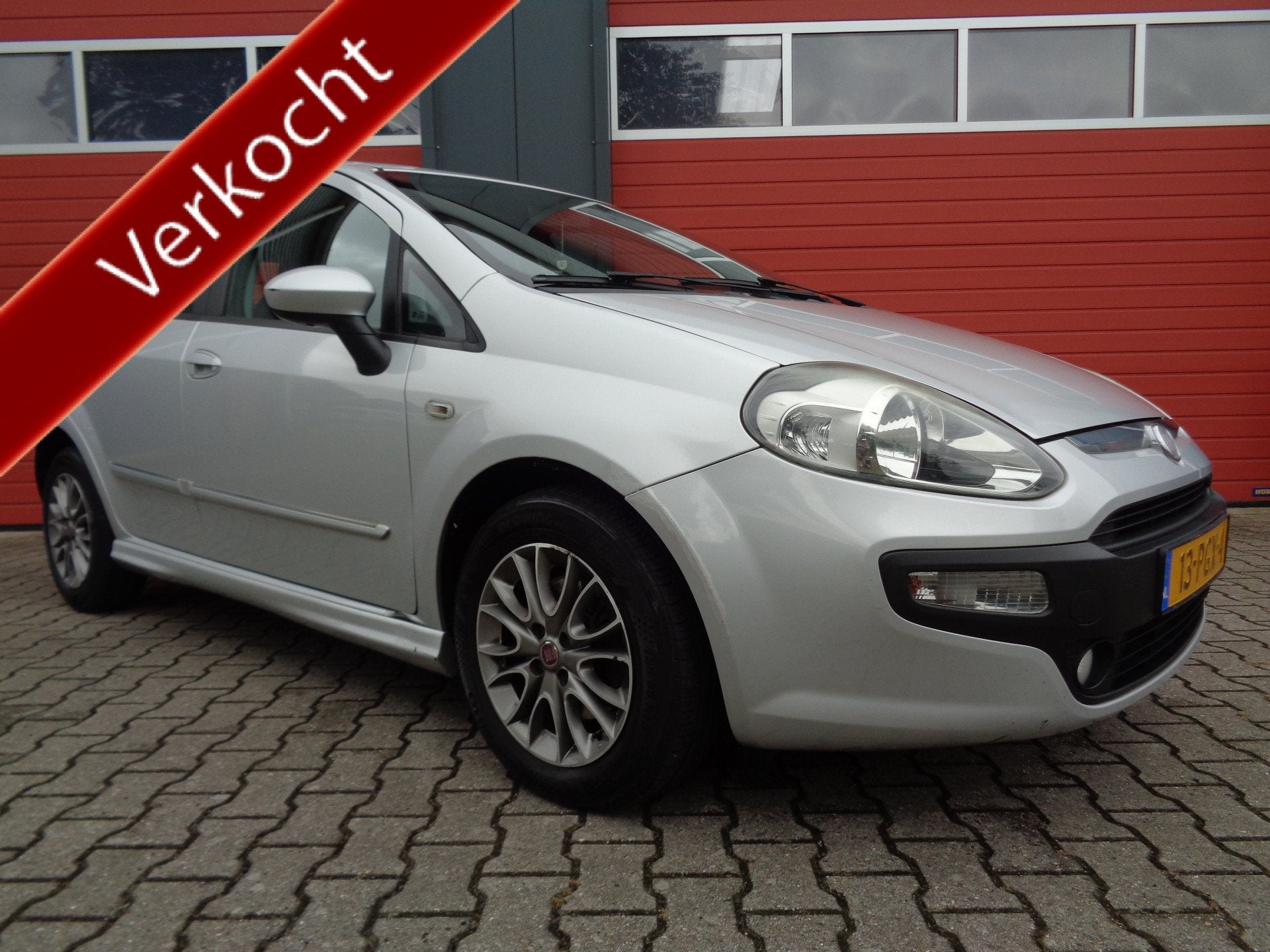 Fiat Punto Evo 1.3 M-Jet Dynamic Clima Cruise LMV Navi 5DRS, Auto's, Fiat, Voorwielaandrijving, Euro 5, Gebruikt, Navigatiesysteem