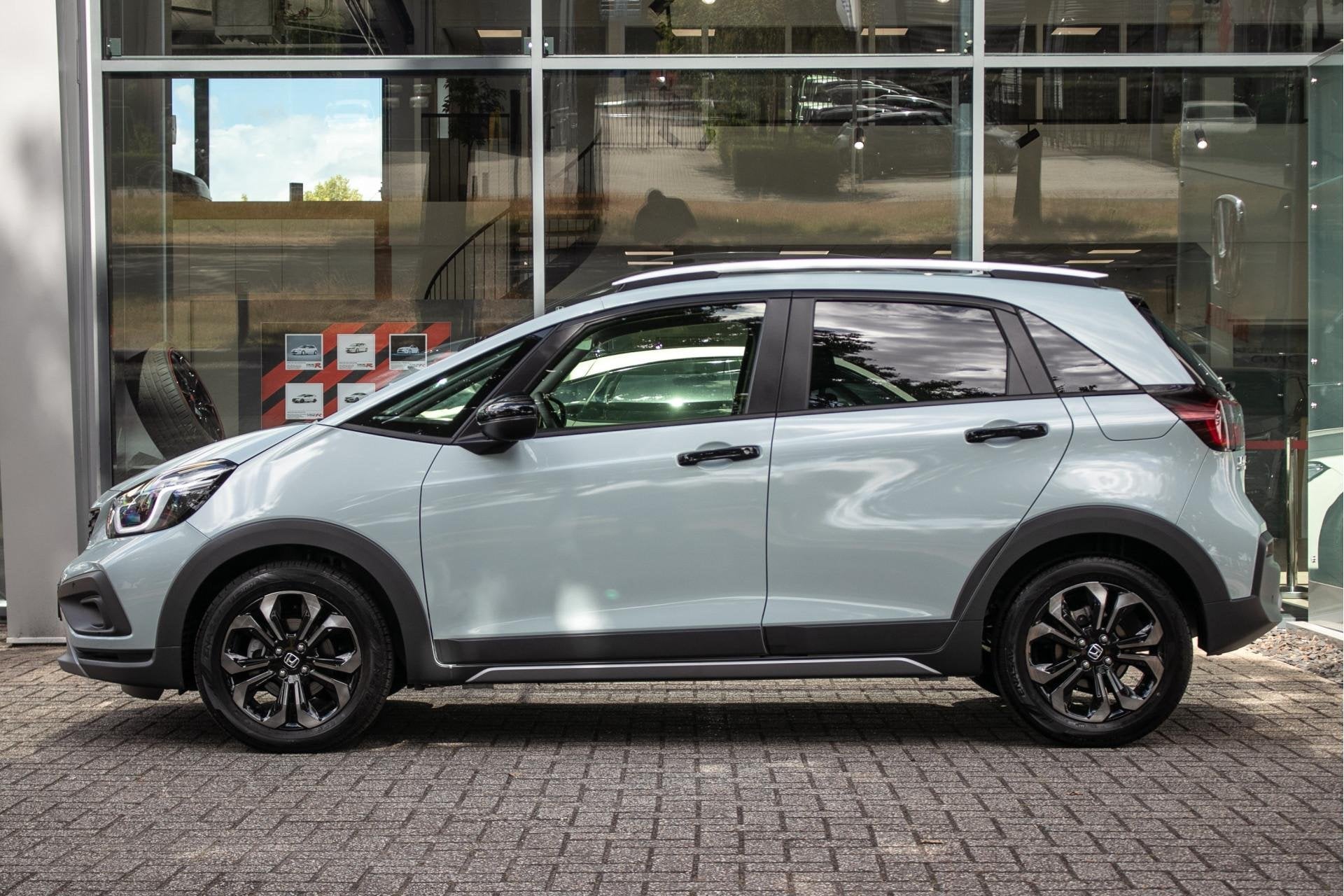 Honda Jazz 1.5 e:HEV Advance Crosstar -Navi | Apple Carpl/An, Auto's, 4 cilinders, Blauw, Leder en Stof, 122 pk