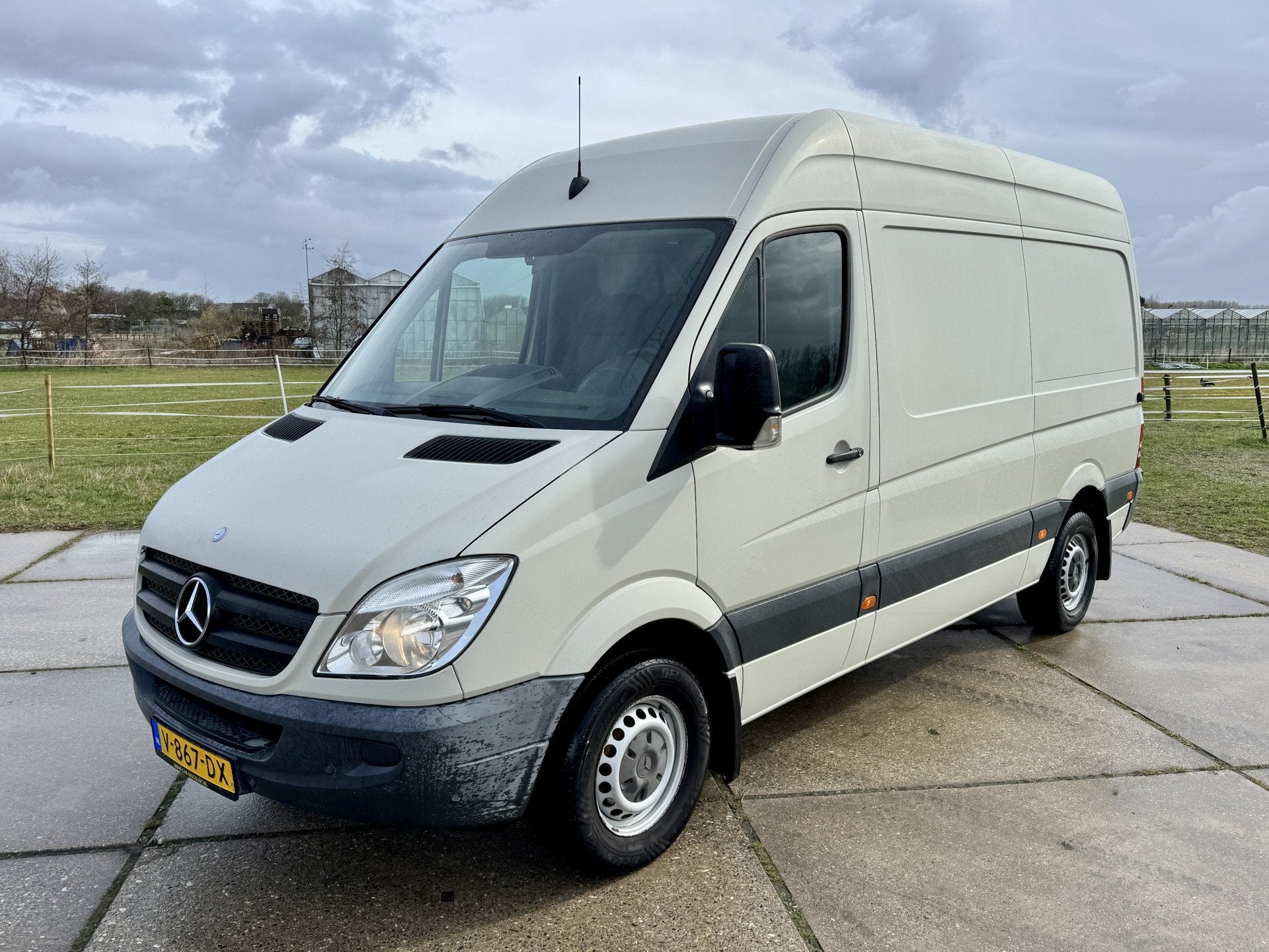 Mercedes-Benz Sprinter 313CDI 130pk L2 H2 airco automaat, Euro 5, Gebruikt, Zwart, 2255 kg