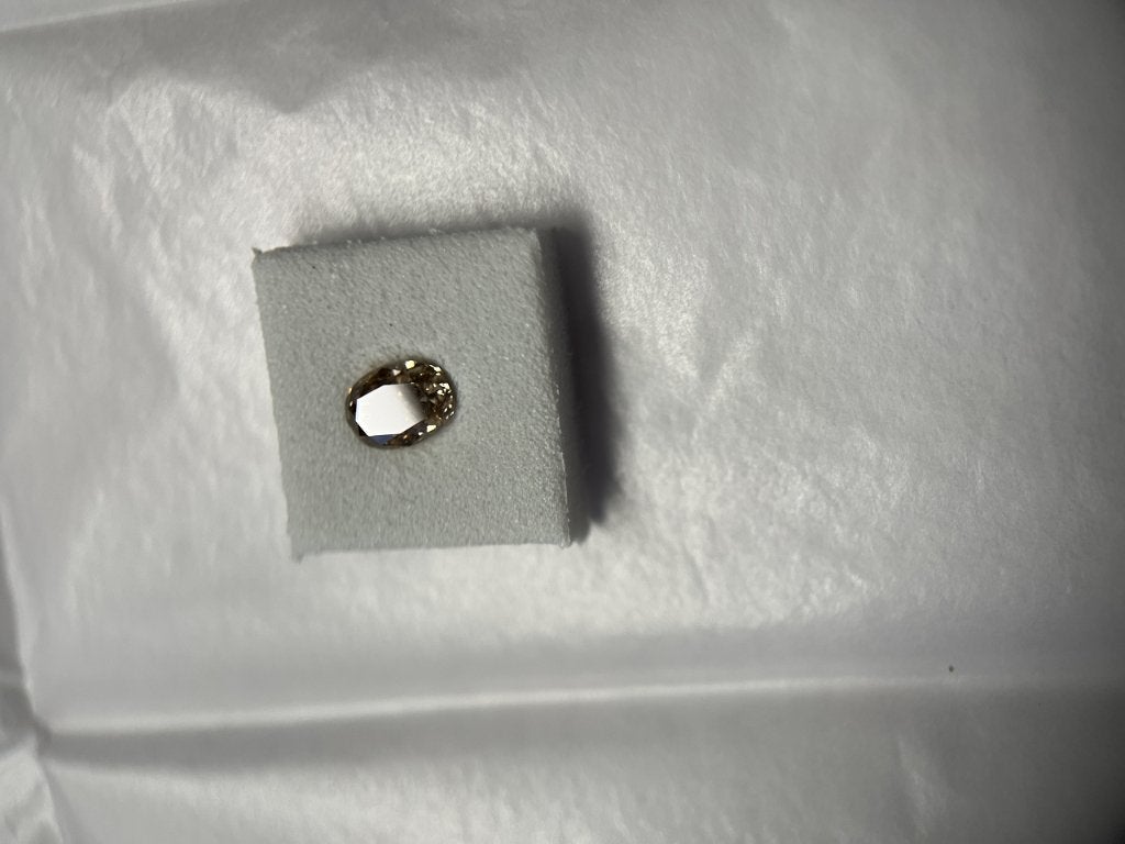 Natural diamond oval brilliant-cut 0,65 ct (67), Ophalen of Verzenden, Zo goed als nieuw