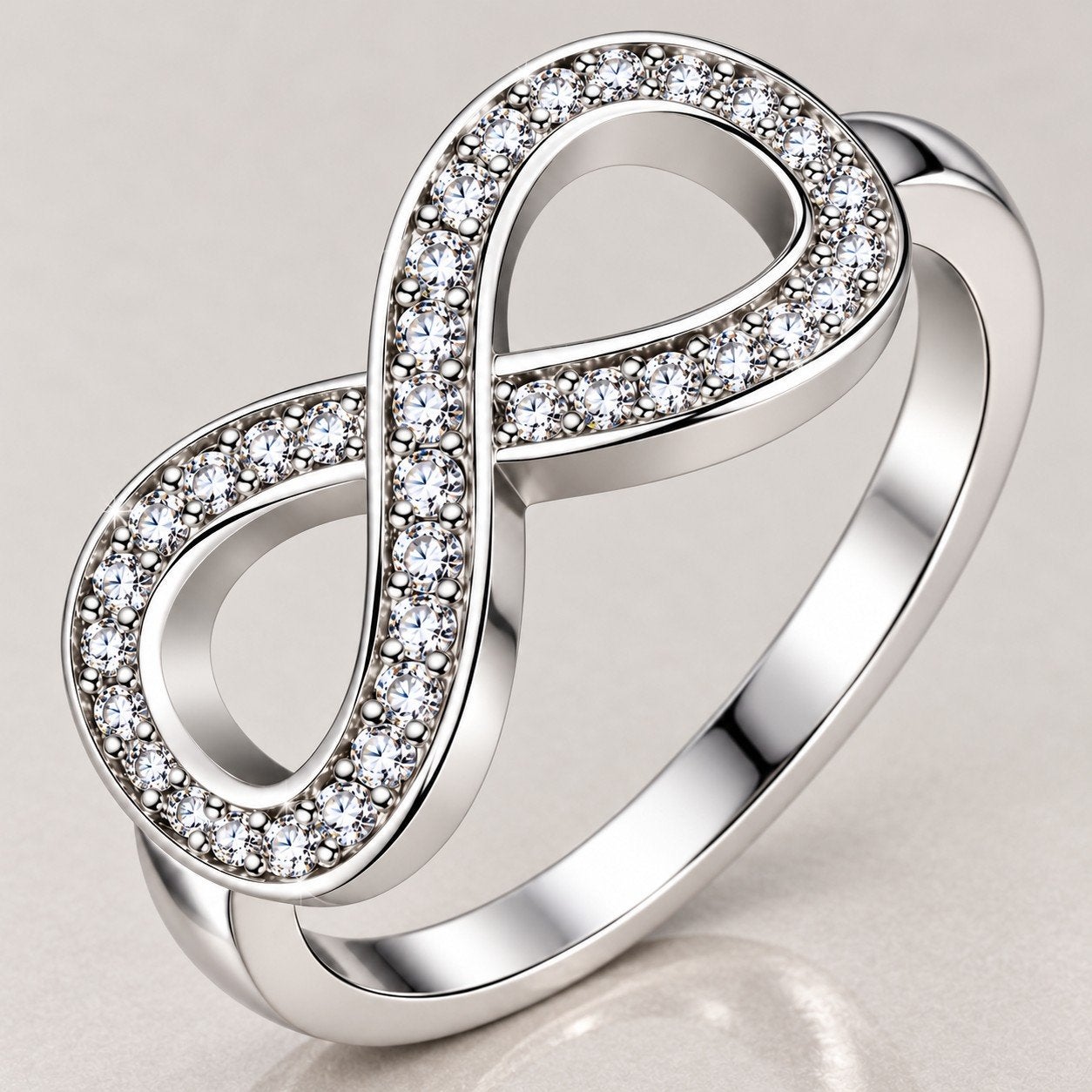 Zilverkleurige RVS infinity-ring met fonkelende steentjes, Sieraden, Tassen en Uiterlijk, IJzer of Staal, Nieuw, Ophalen of Verzenden