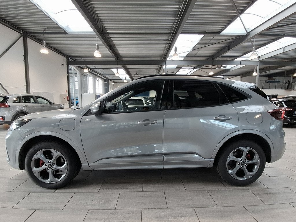 Ford Kuga 2.5 PHEV 243 pk ST-Line X I AGR stoelen | Adapt Cr, Auto's, Ford, 12 maanden, 14 kWh, Gebruikt, Zwart